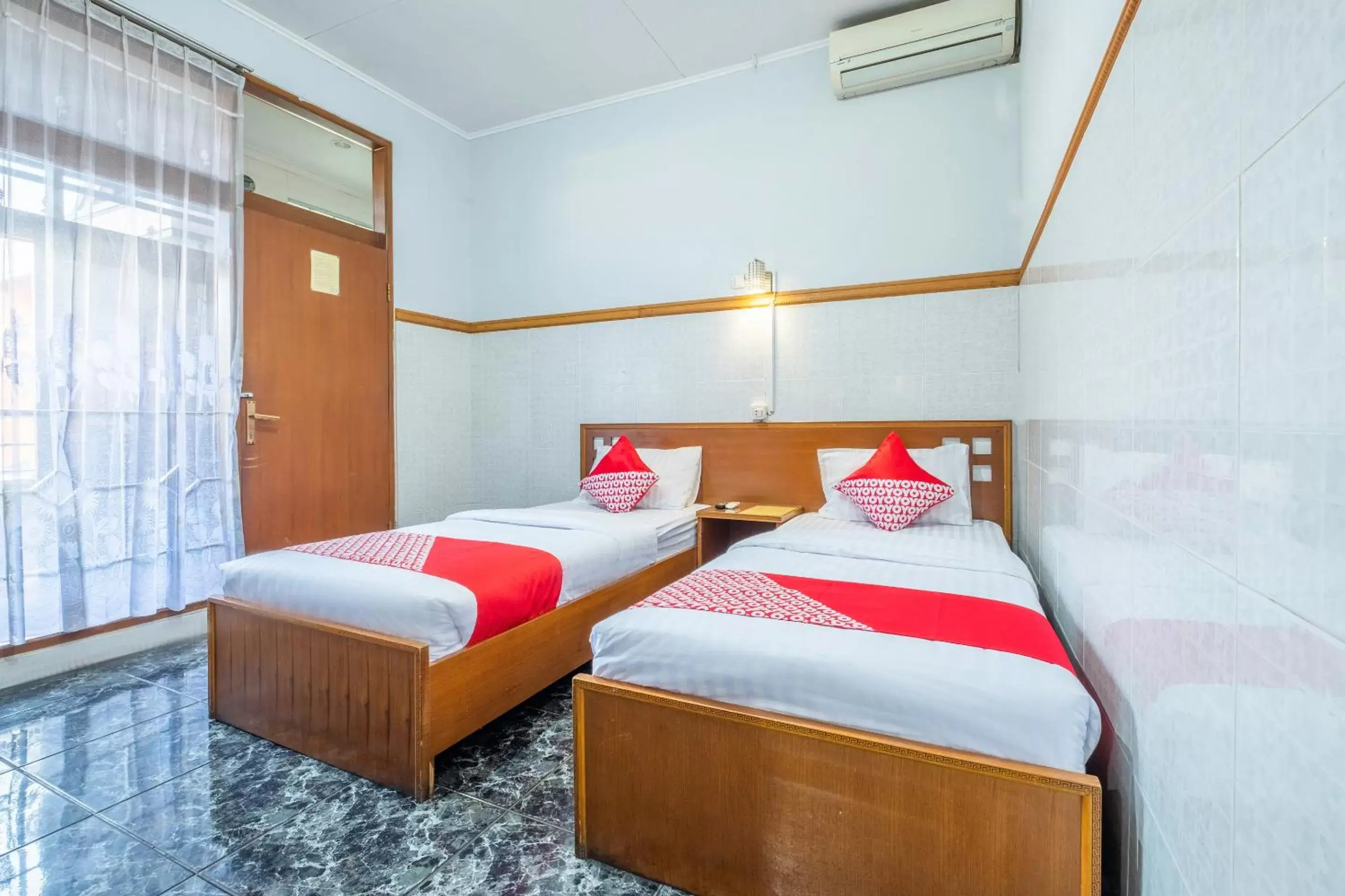 Delxue Twin Room in OYO 1446 Patradisa Hotel Delxue Twin Room in OYO 1446 Patradisa Hotel