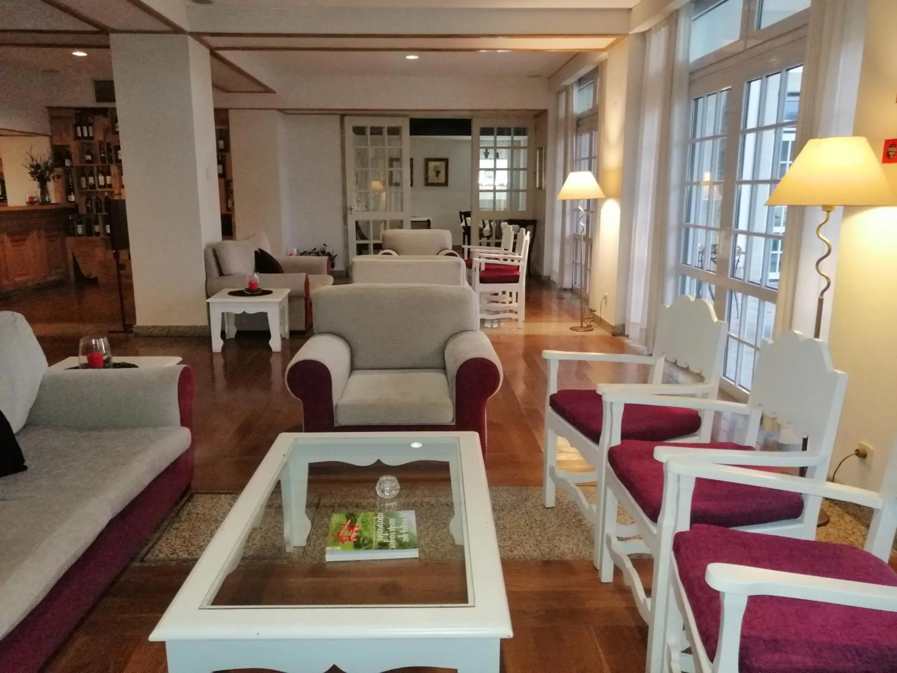 Communal lounge/ TV room, Lobby/Reception in Pousada Barao de Forrester