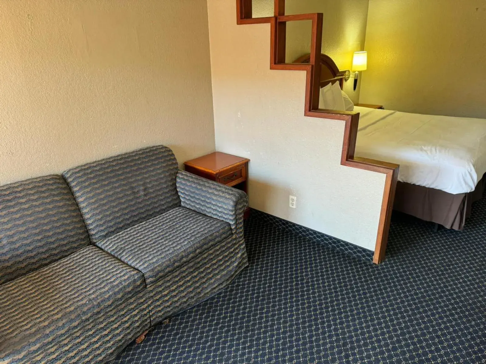 Bedroom, Seating Area in Homegate Studio and Suites San Antonio