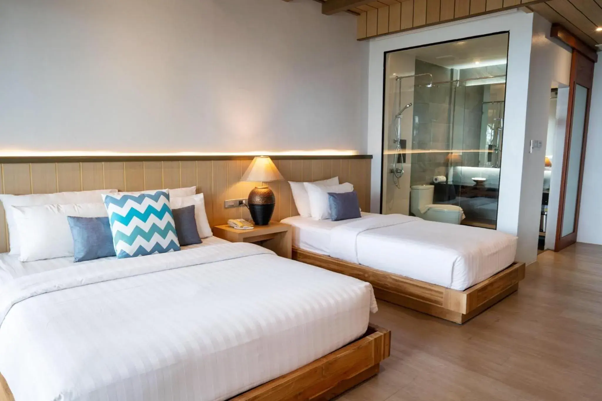 Photo of the whole room, Bed in Coral Cliff Beach Resort Samui - SHA Plus