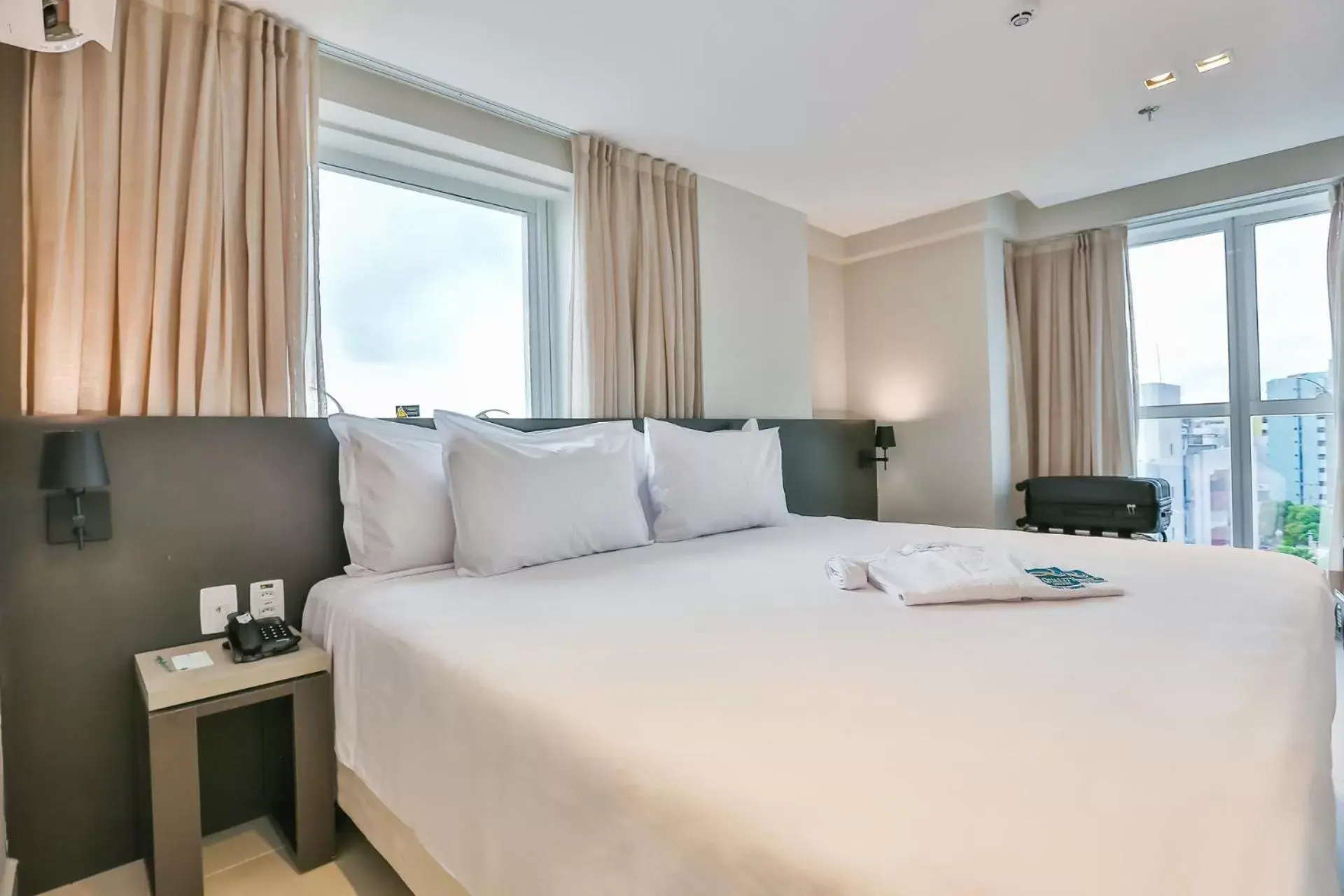 Bed in Quality Suítes João Pessoa Bed in Quality Suítes João Pessoa