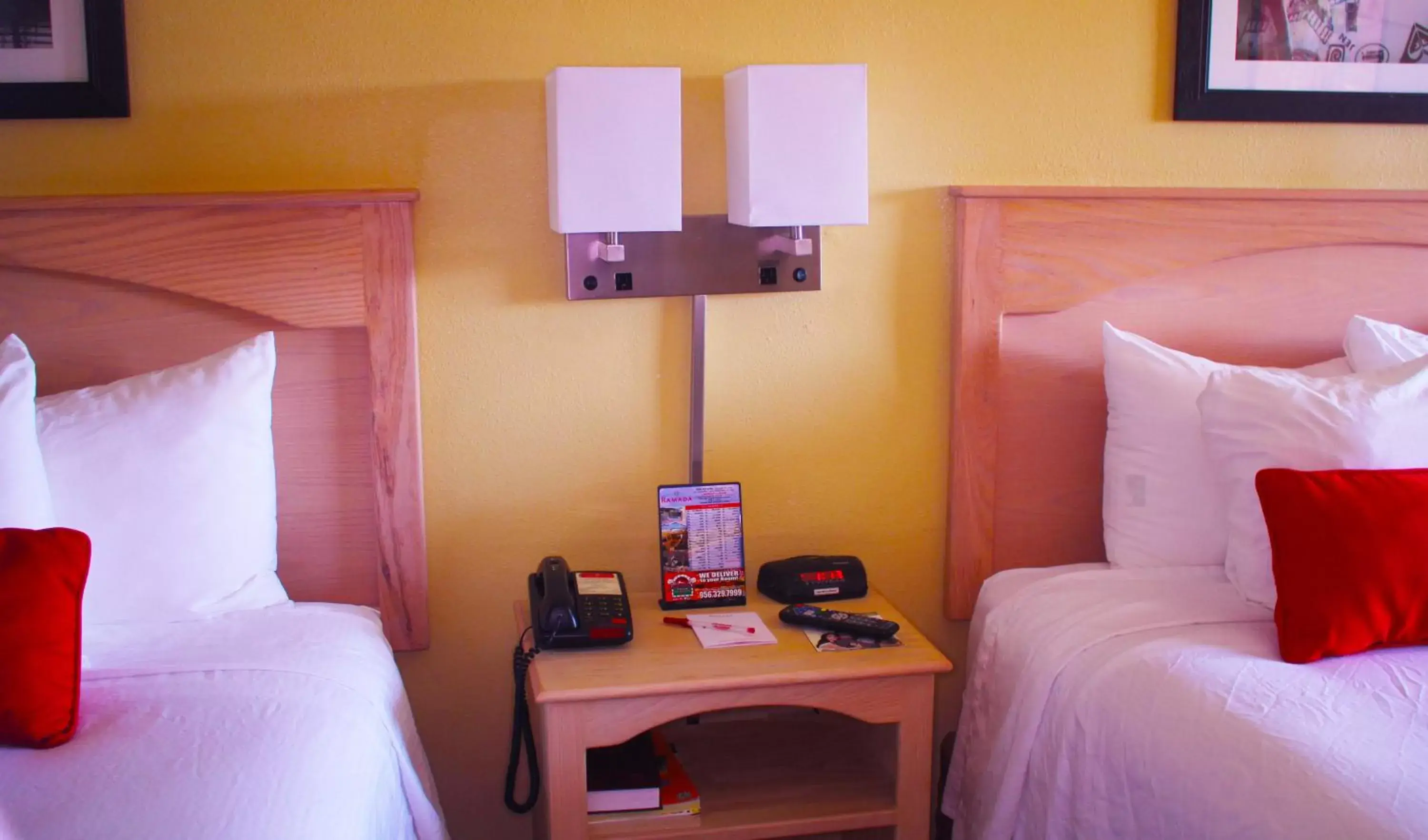 Bed in Ramada by Wyndham & Suites South Padre Island Bed in Ramada by Wyndham & Suites South Padre Island