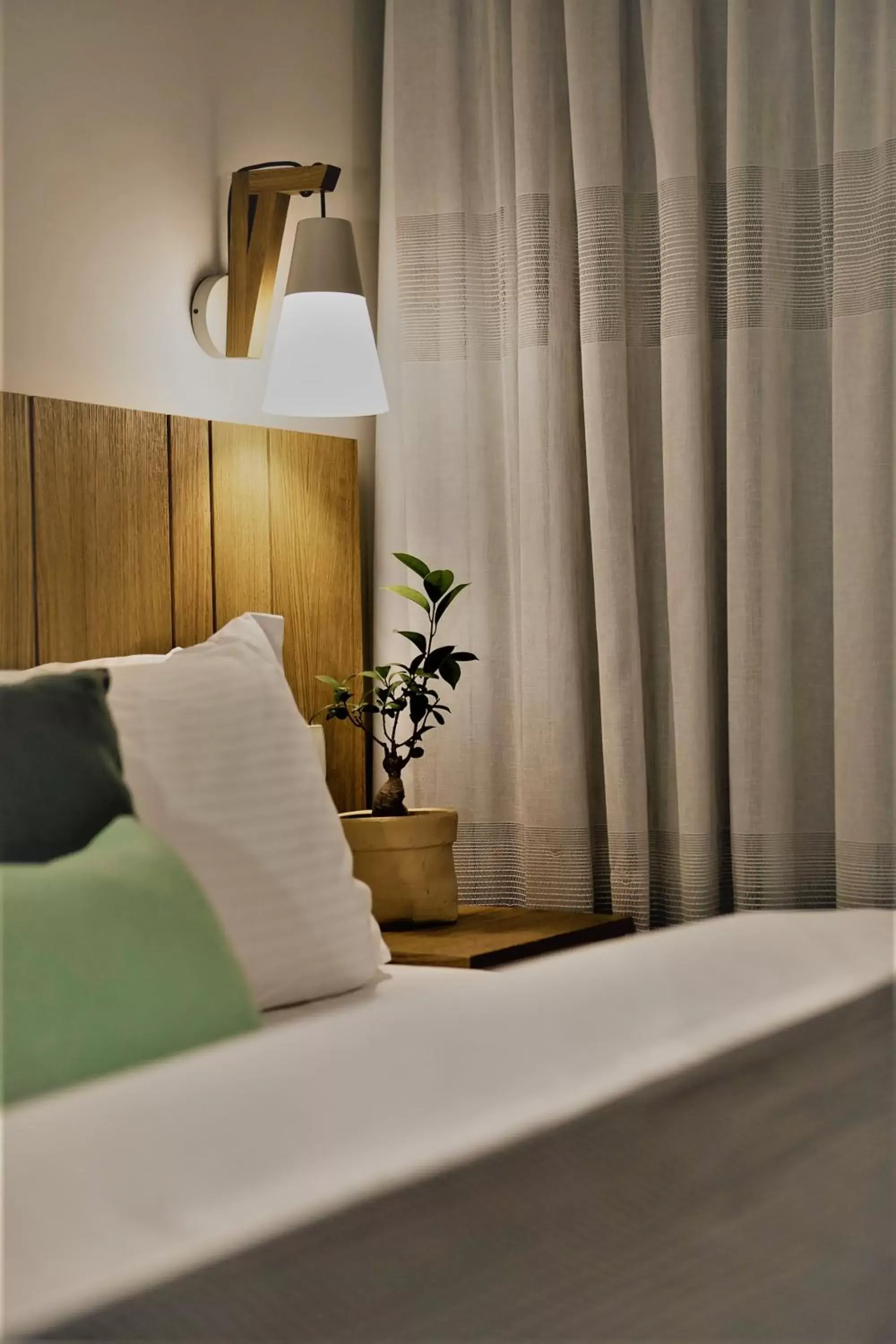 Bed in Mirivili Rooms & Suites