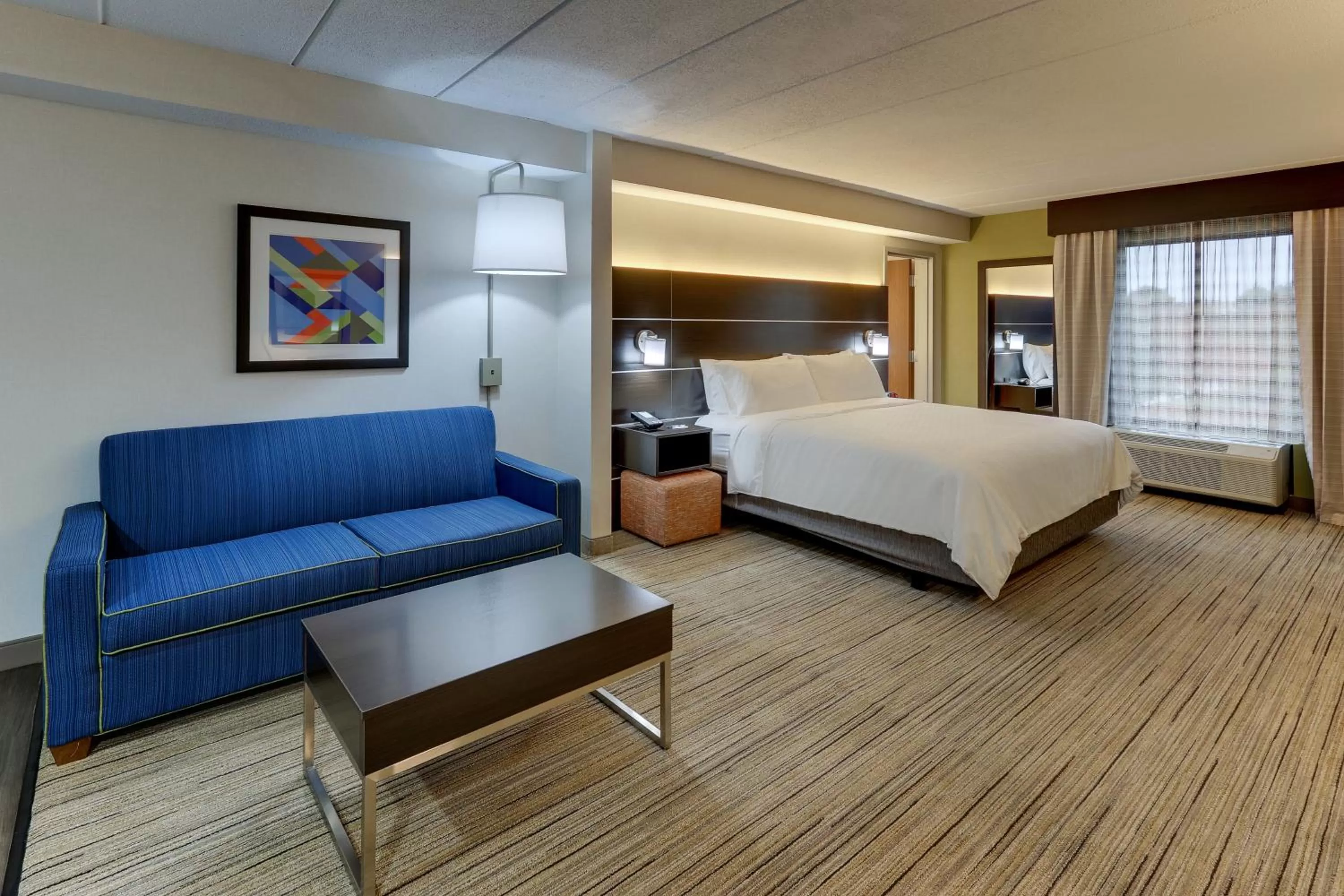 Seating area, Bed in Holiday Inn Express & Suites Troy by IHG