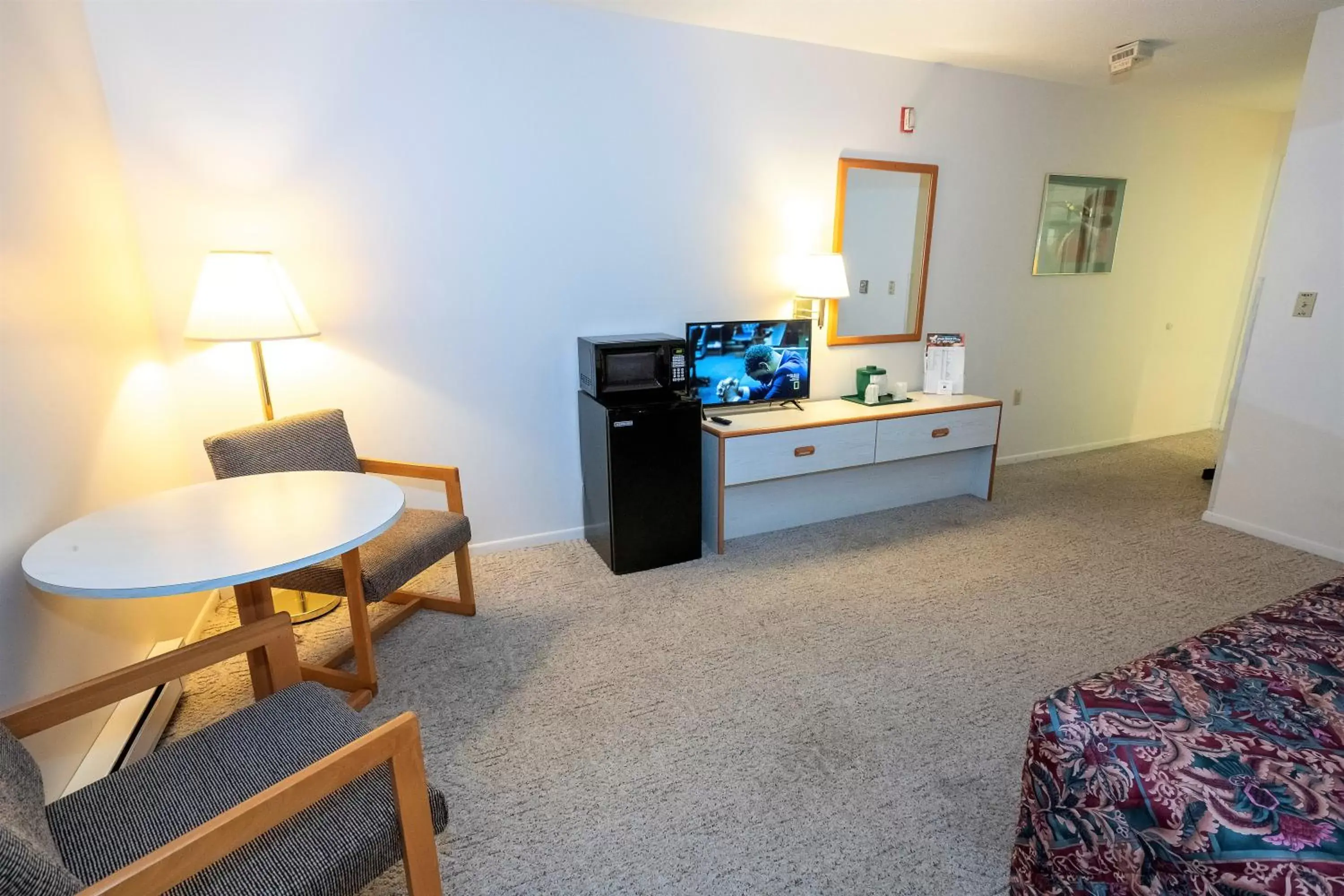 Photo of the whole room, TV/Entertainment Center in Mountain Host Motor Inn