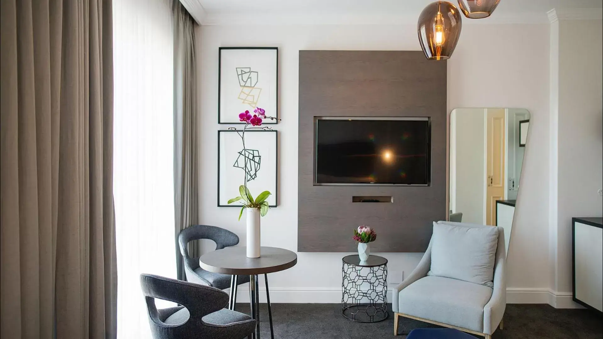 Seating Area in The Manor House at the Queen Victoria Hotel by NEWMARK