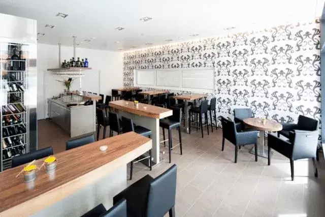 Lounge or bar in Hotel Arcade Lounge or bar in Hotel Arcade