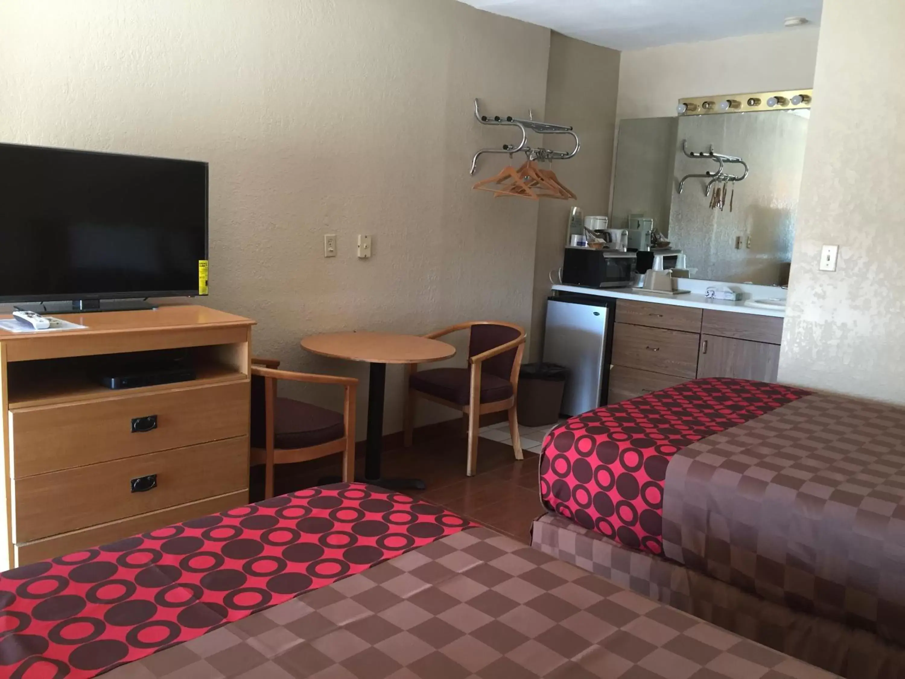 Photo of the whole room, TV/Entertainment Center in Townhouse Inn and Suites