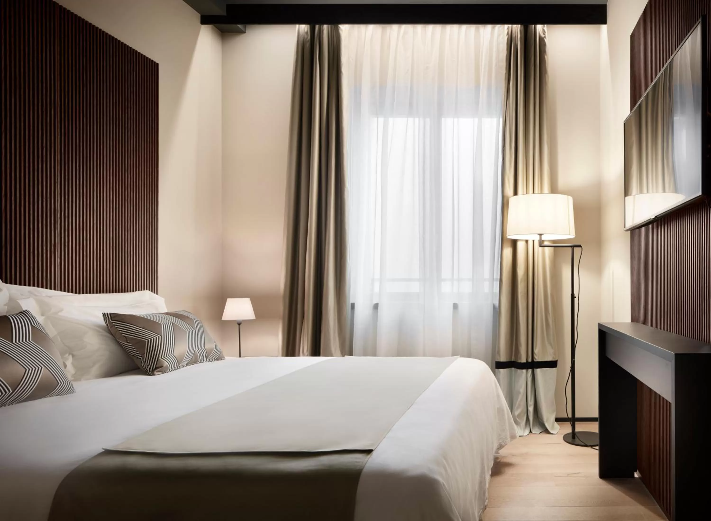 Bed in Speronari Suites