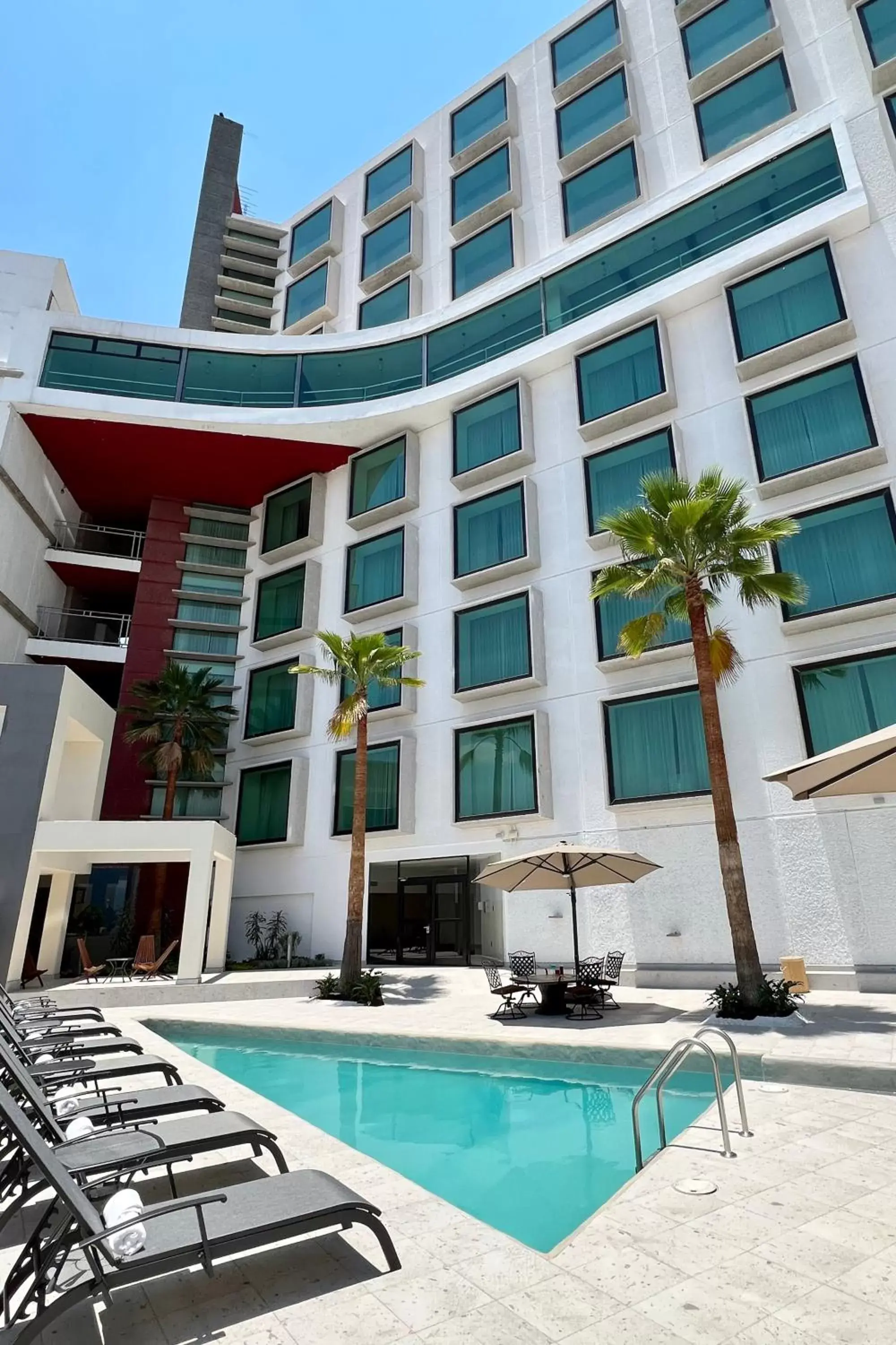 Swimming pool, Property Building in Hotel Diamante Queretaro