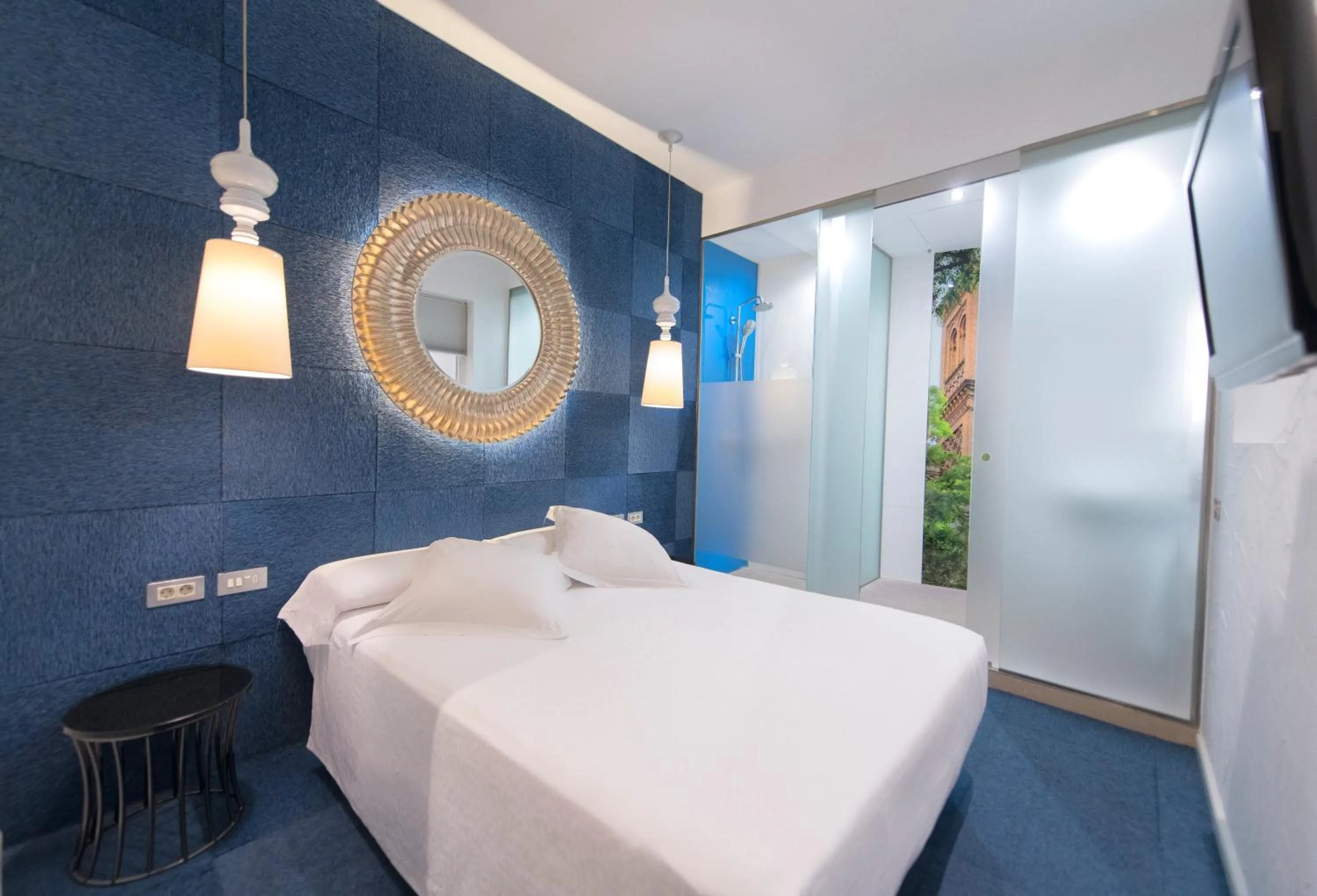 Bed in Posada del Dragón Boutique Hotel