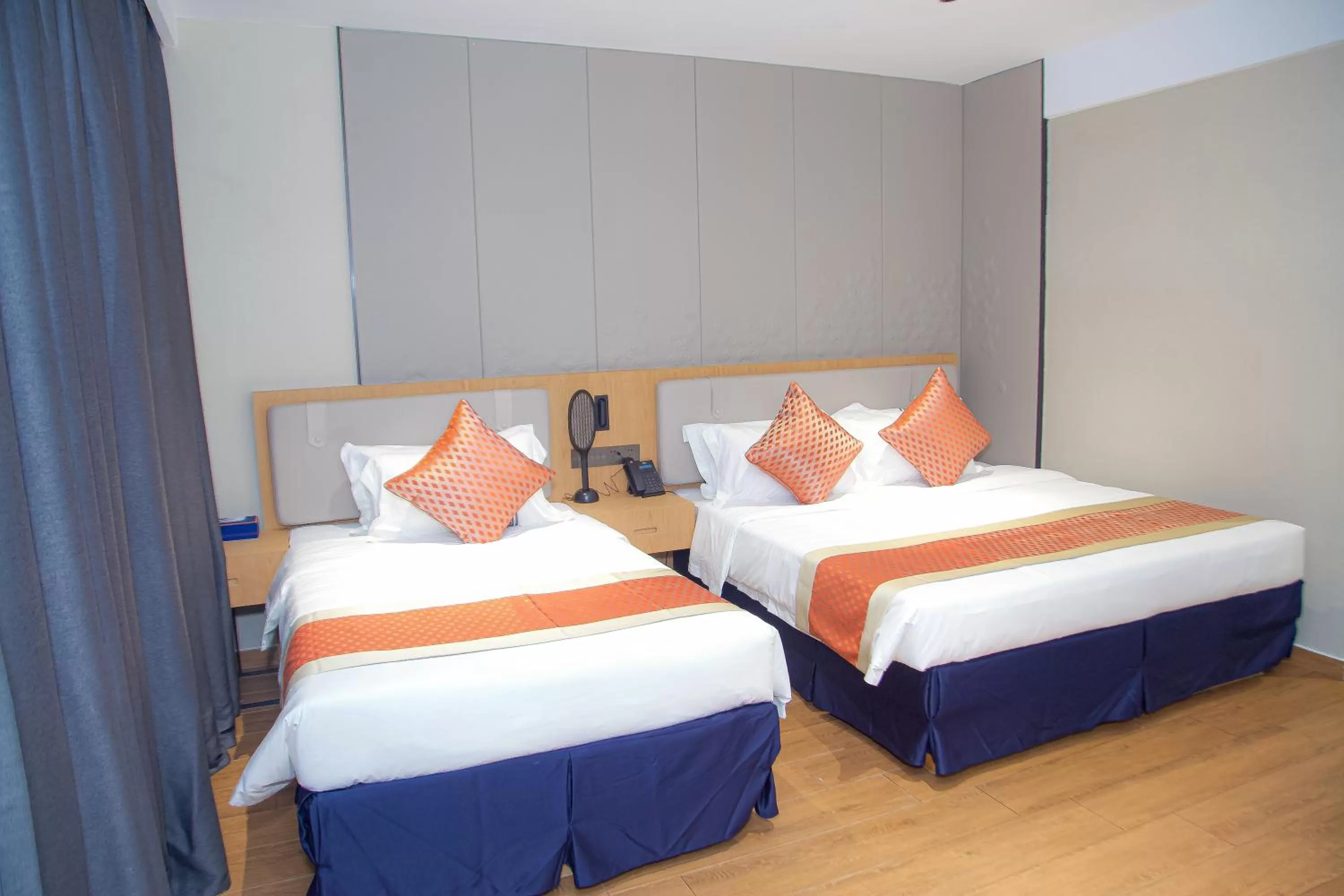 Photo of the whole room in Hôtel FAMILLE MONDIALE