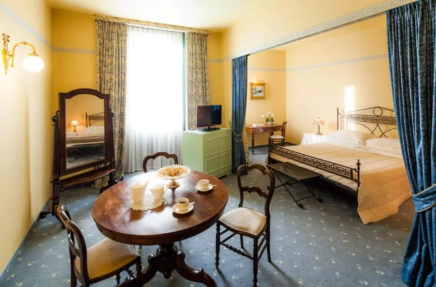 Photo of the whole room, Bed in Cosmo Hotel Torri