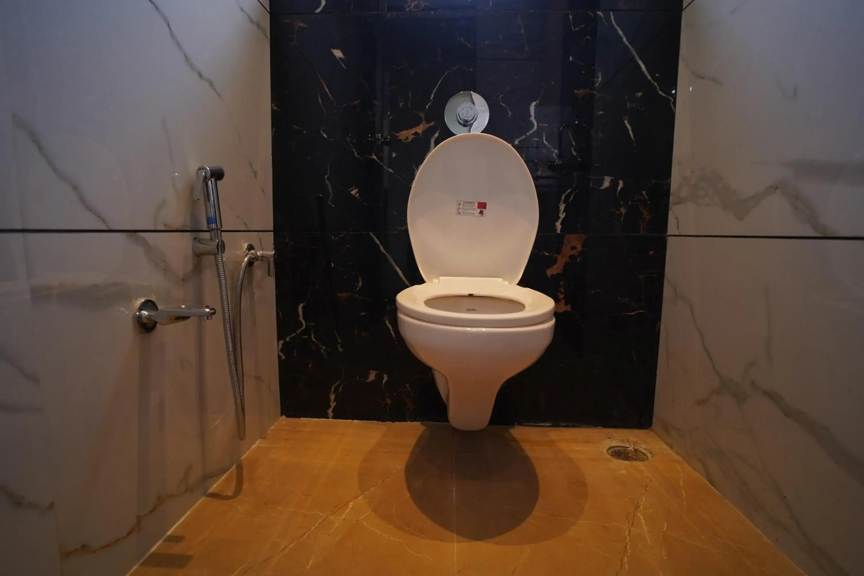 Toilet, Bathroom in Hotel Madhavan International