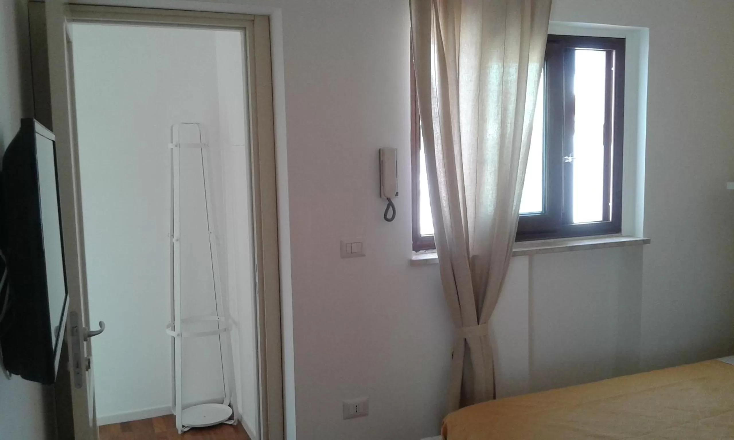 Bed, TV/Entertainment Center in Dimora Dioniso