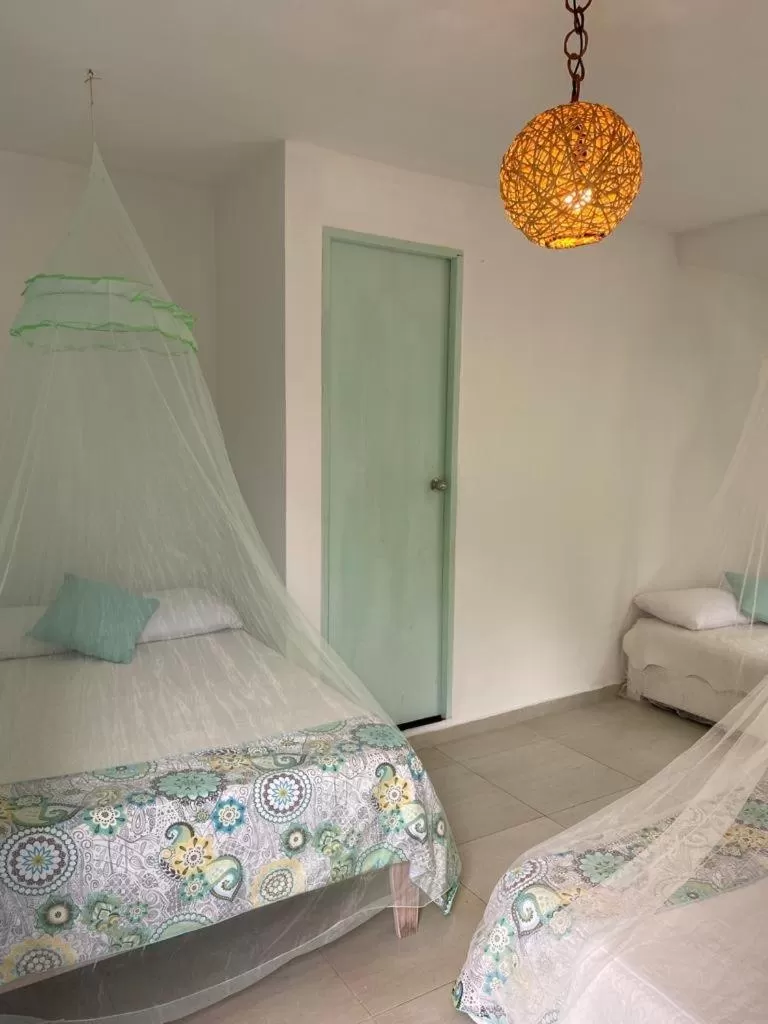 Bed in Massalli Sanctuary Lodge