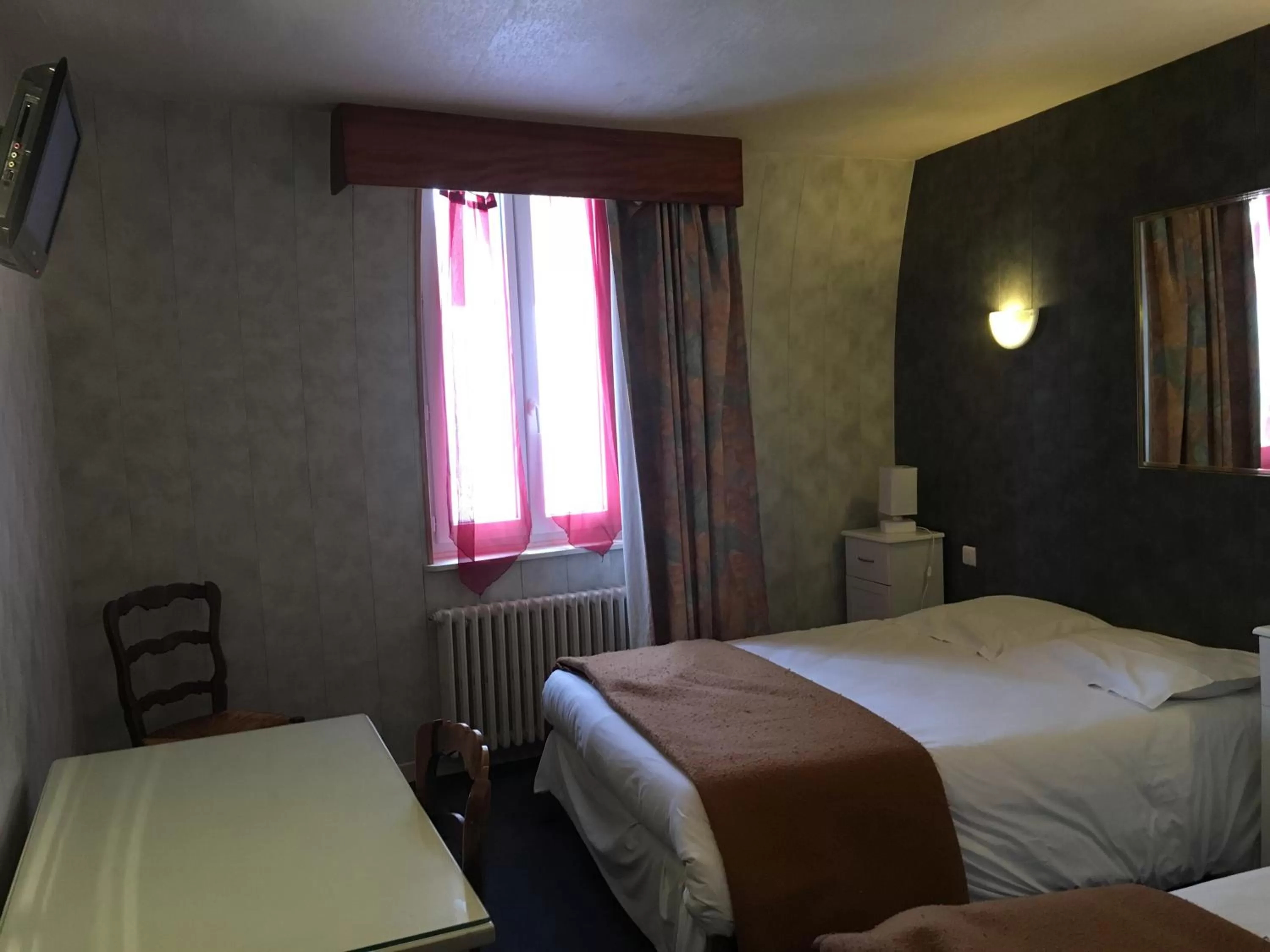 Bed in Hotel du Rempart