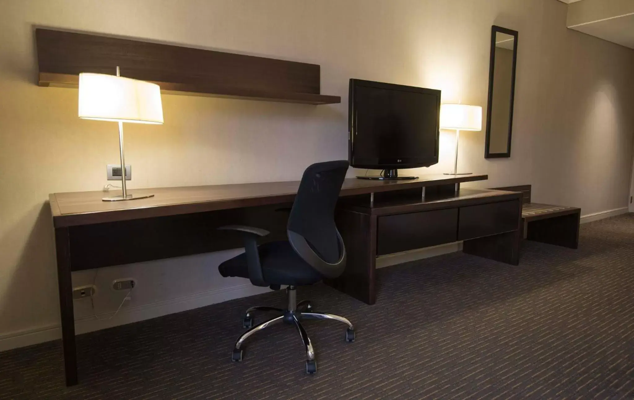 Photo of the whole room, TV/Entertainment Center in Holiday Inn Express - Concepcion, an IHG Hotel