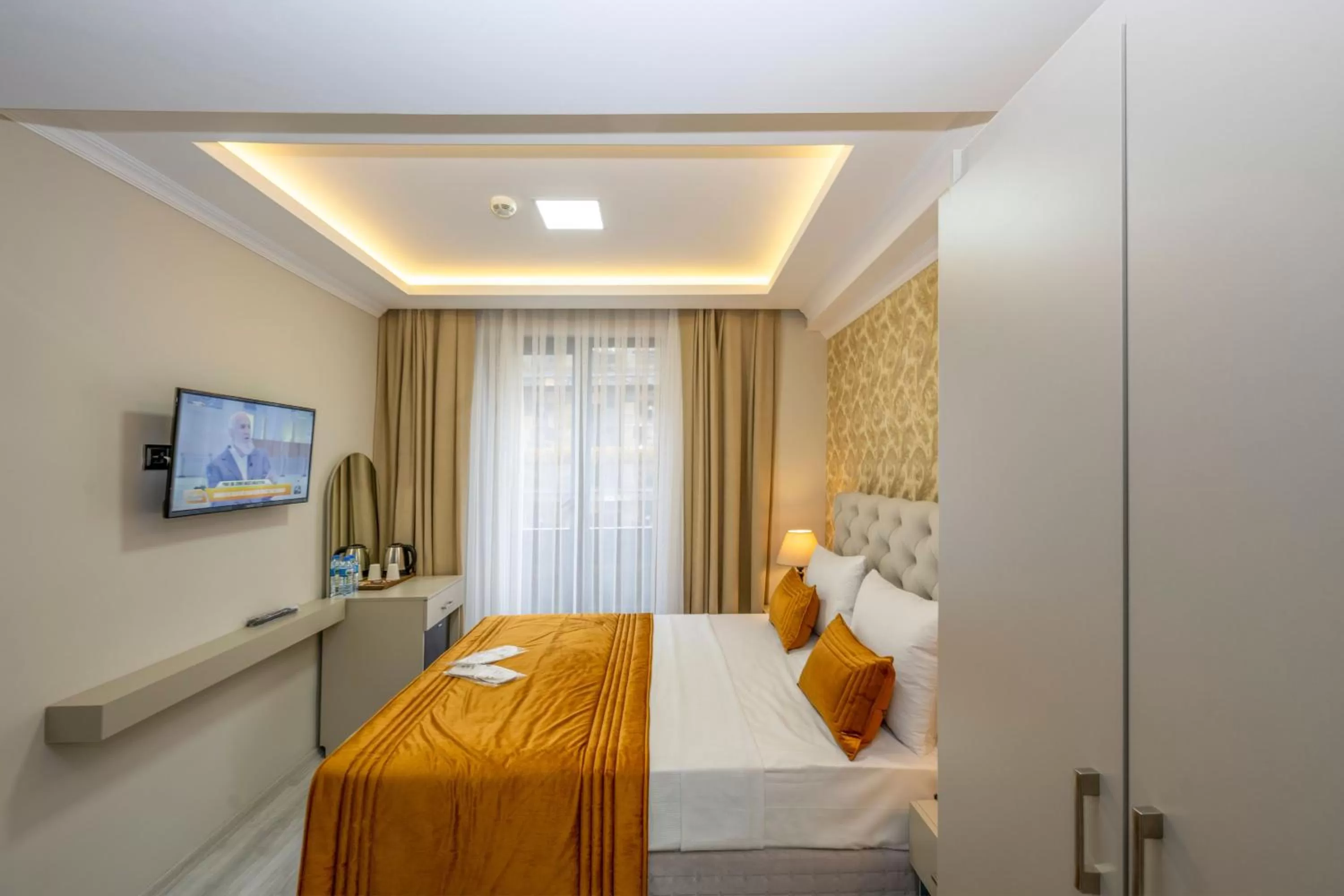 Bed in SKYSTAR DELUXE HOTEL