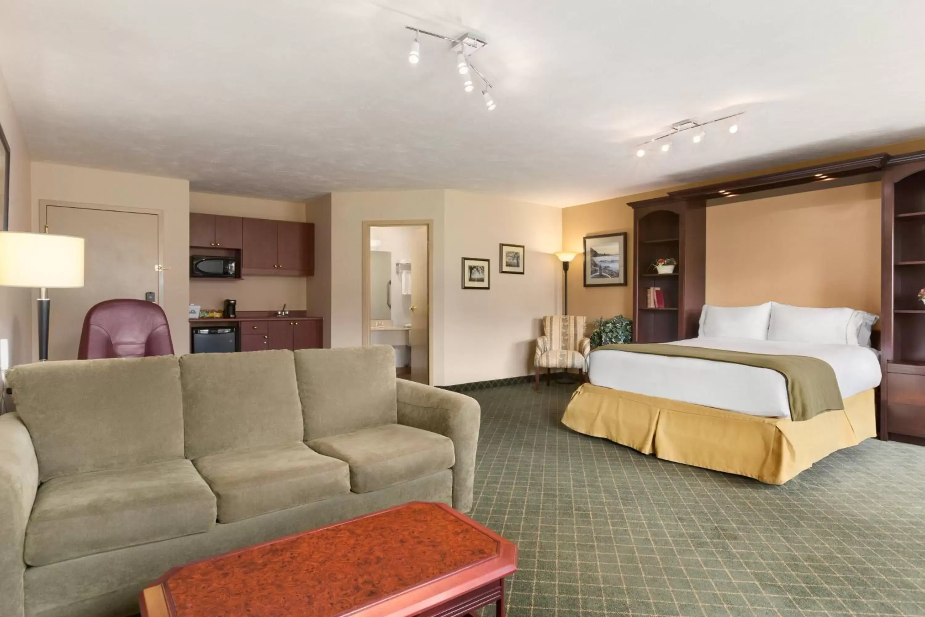 Living room, Room Photo in Days Inn & Suites by Wyndham Moncton