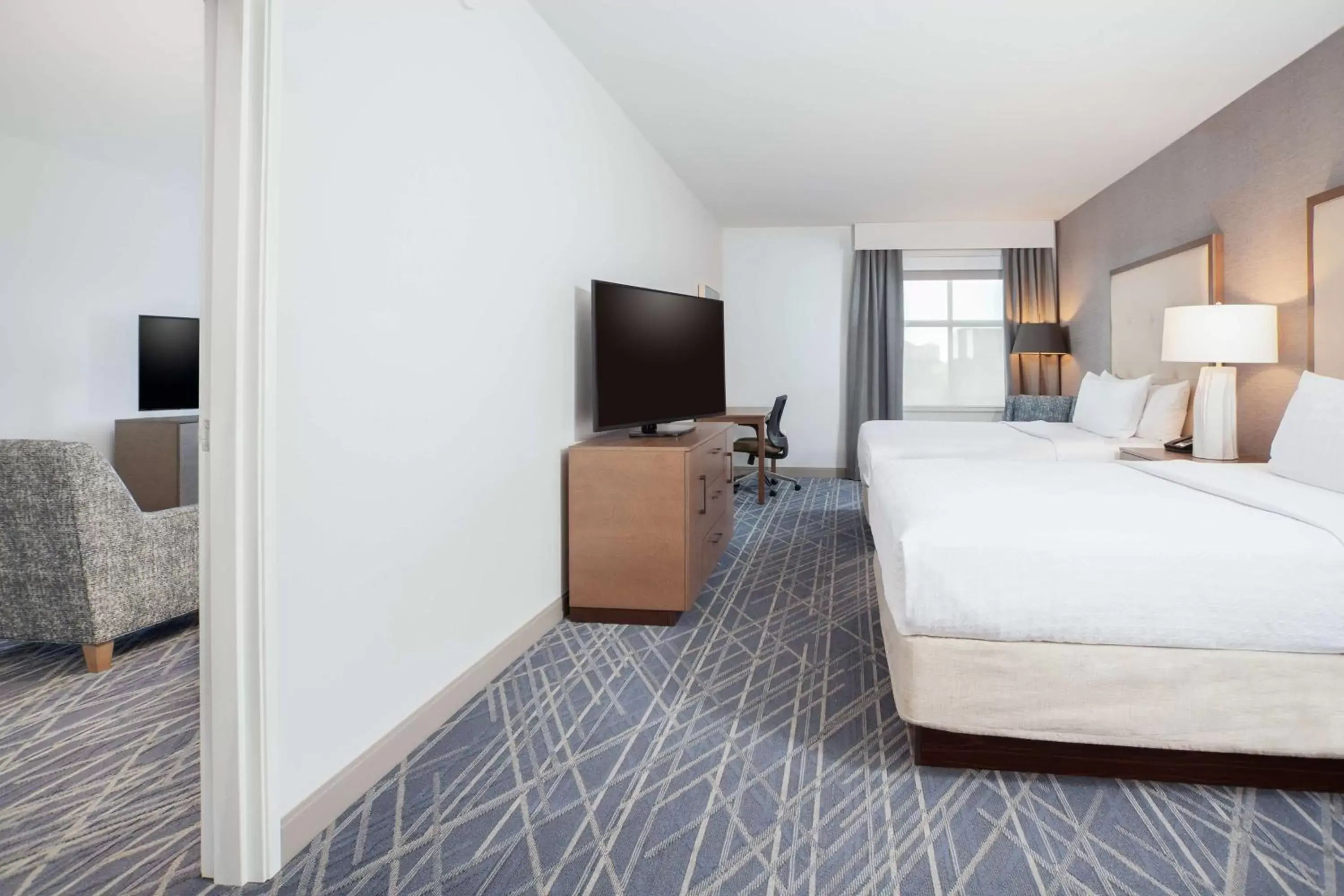 Bedroom, TV/Entertainment Center in Homewood Suites By Hilton Broomfield Boulder