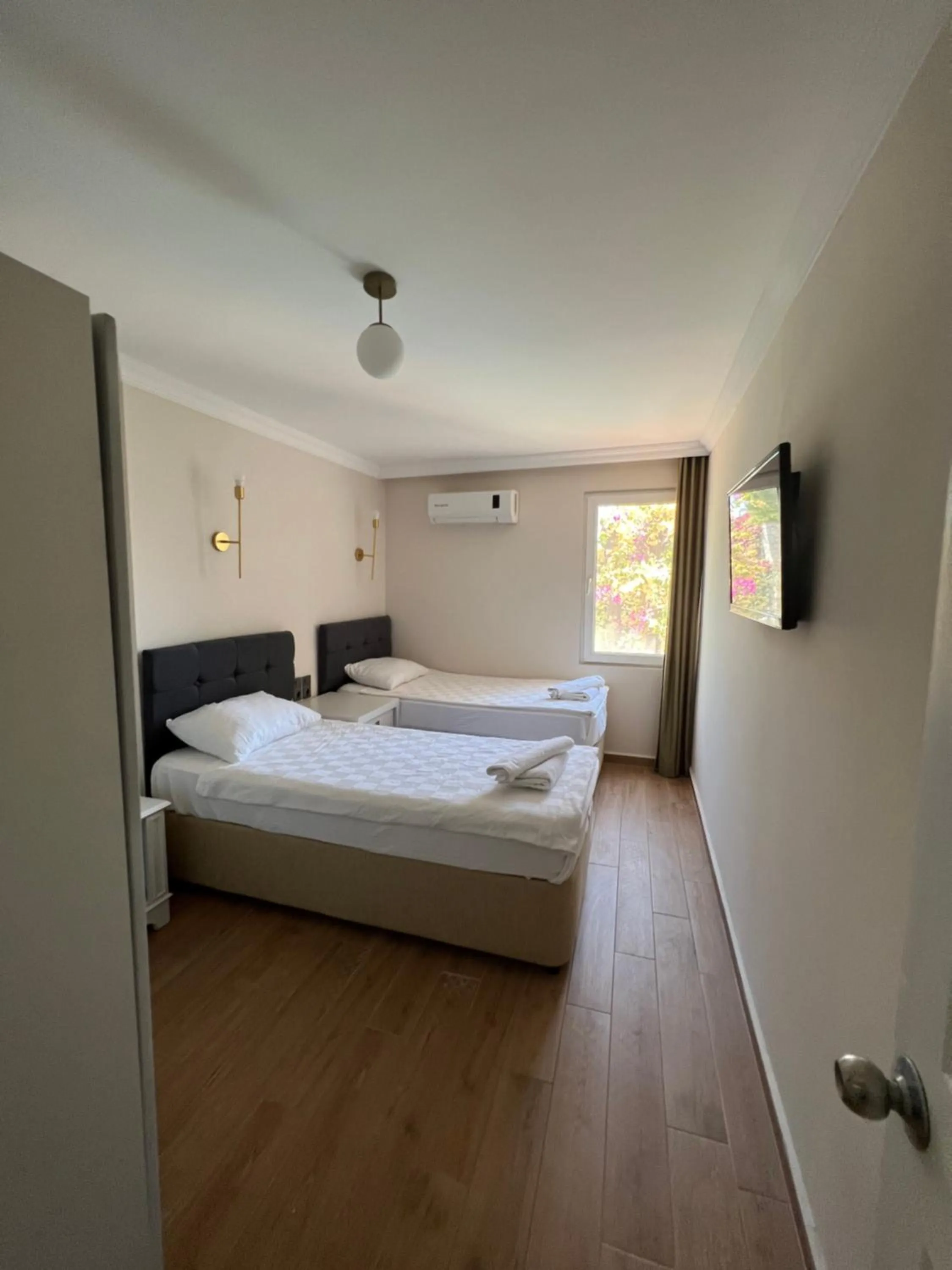 Bedroom, Bed in Moonshine Hotel & Suites