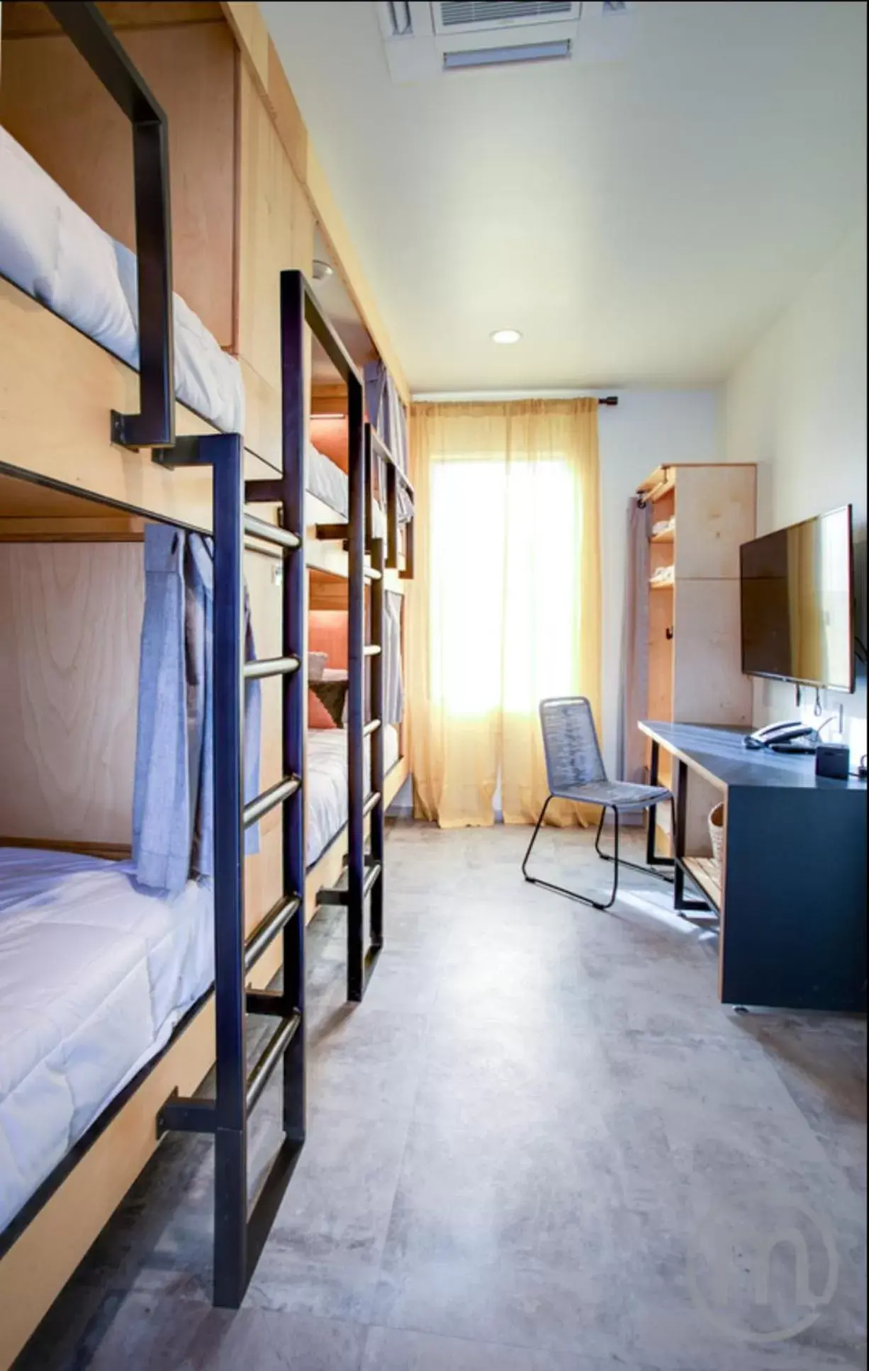 Group/Family Room with 1 Queen bed and 4 Full Bunk beds in The Monterey Motel Group/Family Room with 1 Queen bed and 4 Full Bunk beds in The Monterey Motel