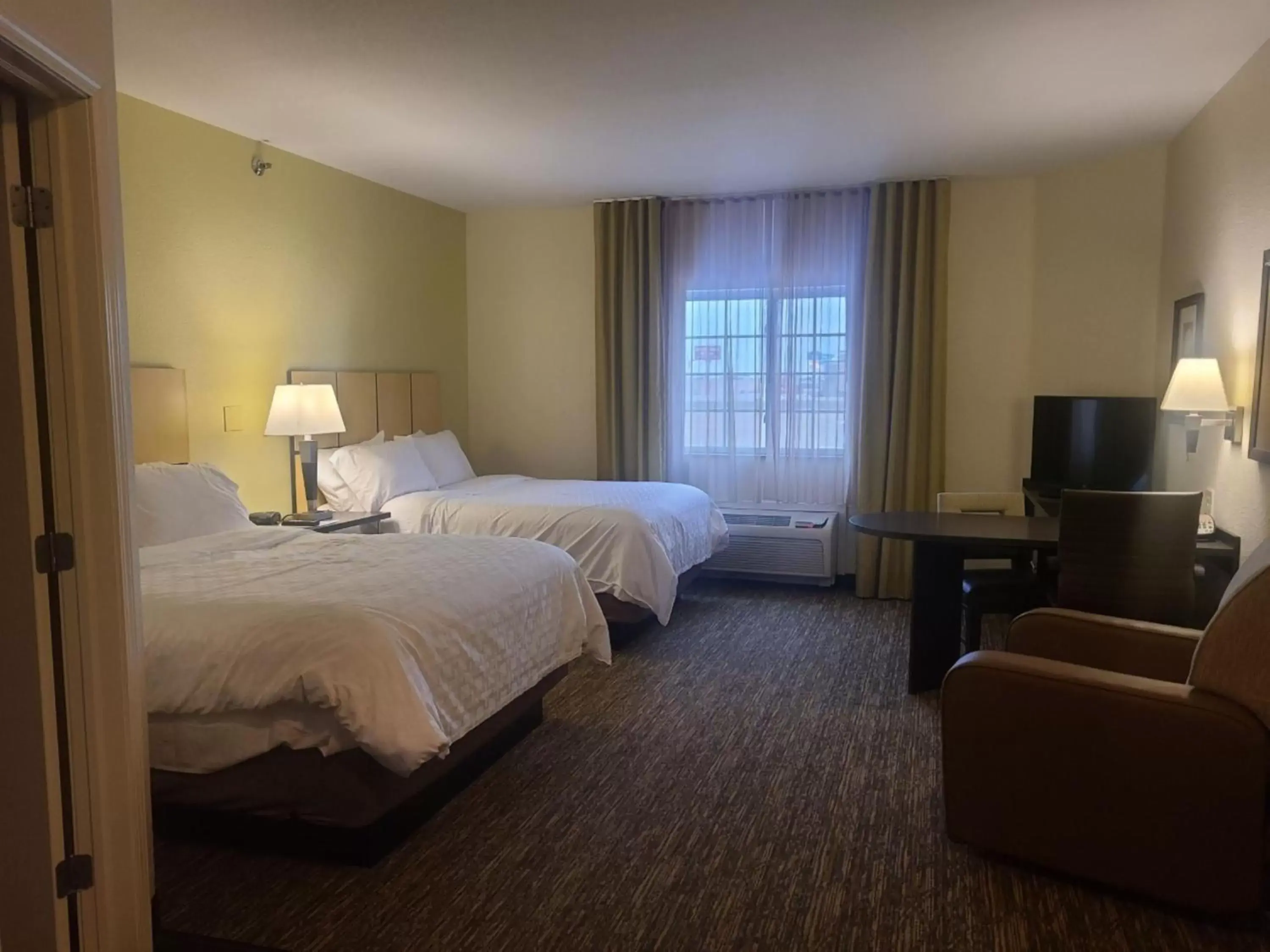 Photo of the whole room, Bed in Candlewood Suites Bismarck