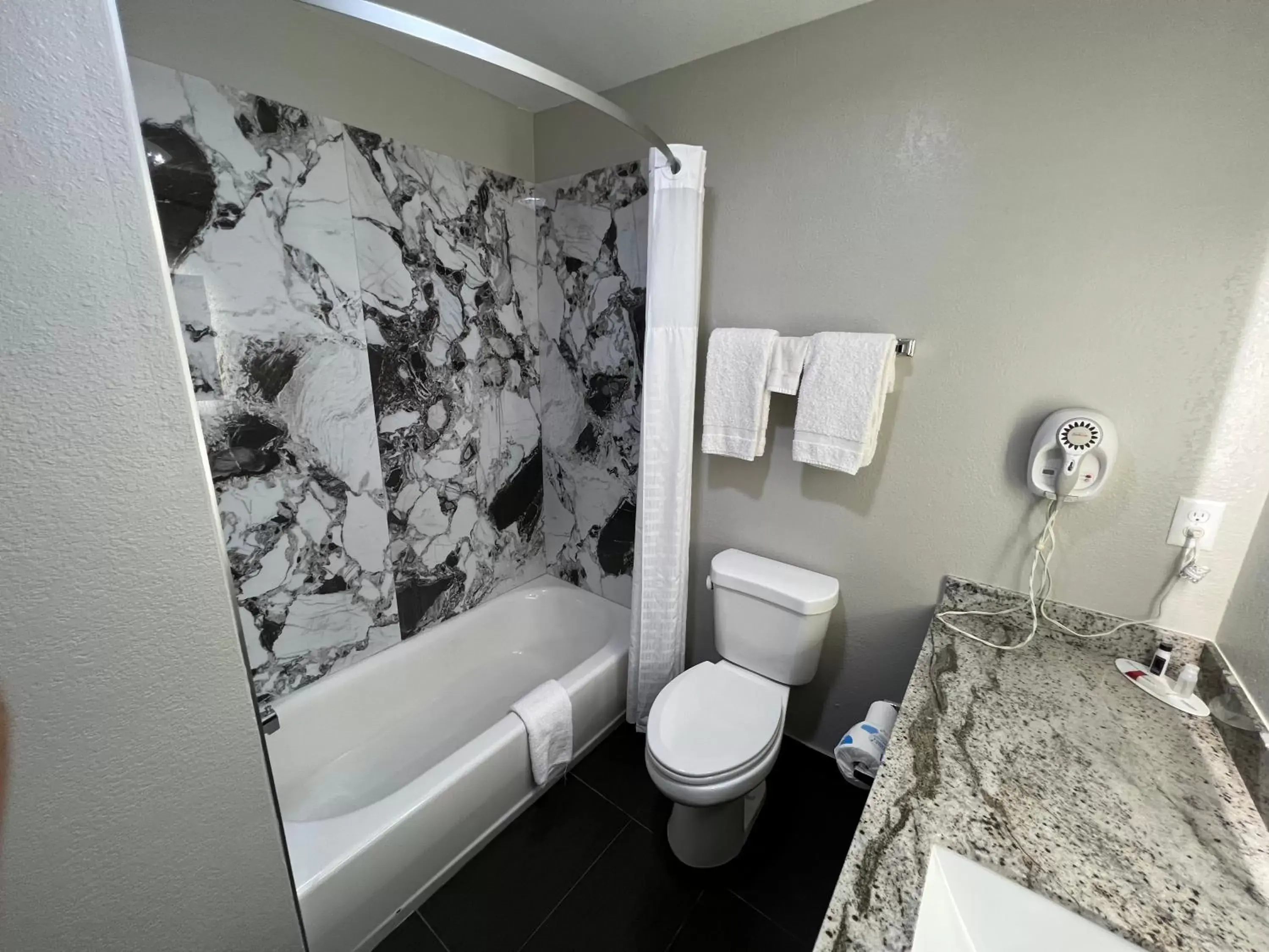 Toilet, Bathroom in Super 8 by Wyndham Lake Charles/Sulphur