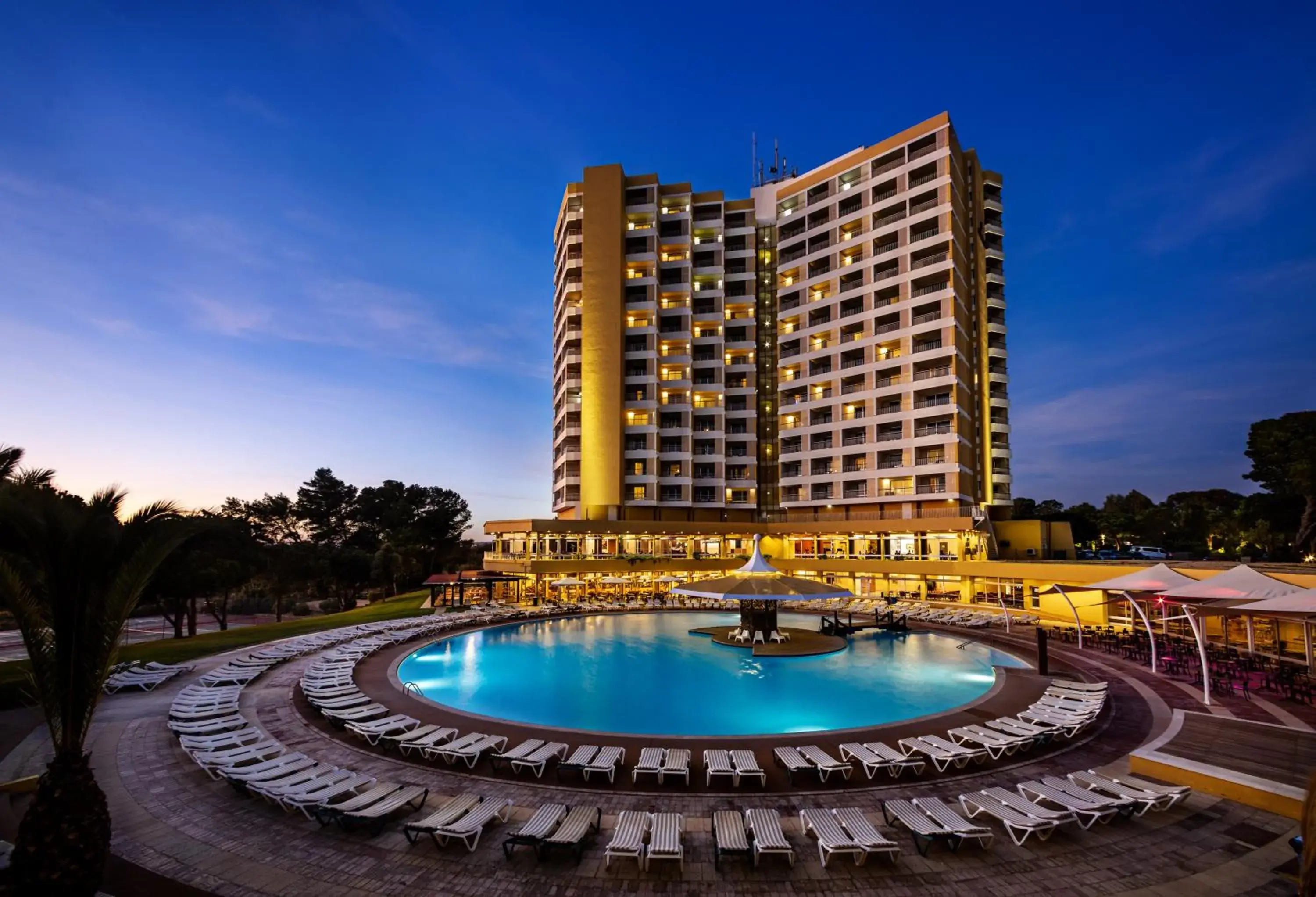 Property building, Swimming Pool in Pestana Delfim Beach & Golf Hotel