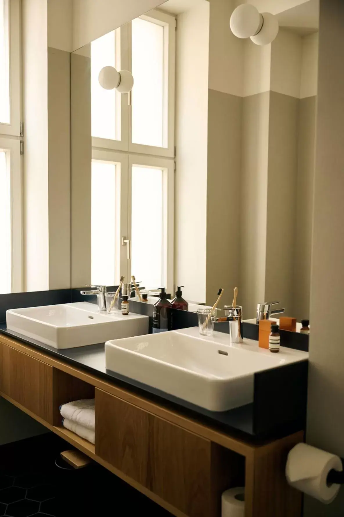 Bathroom in Melter Hotel & Apartments - a Neighborhood Hotel