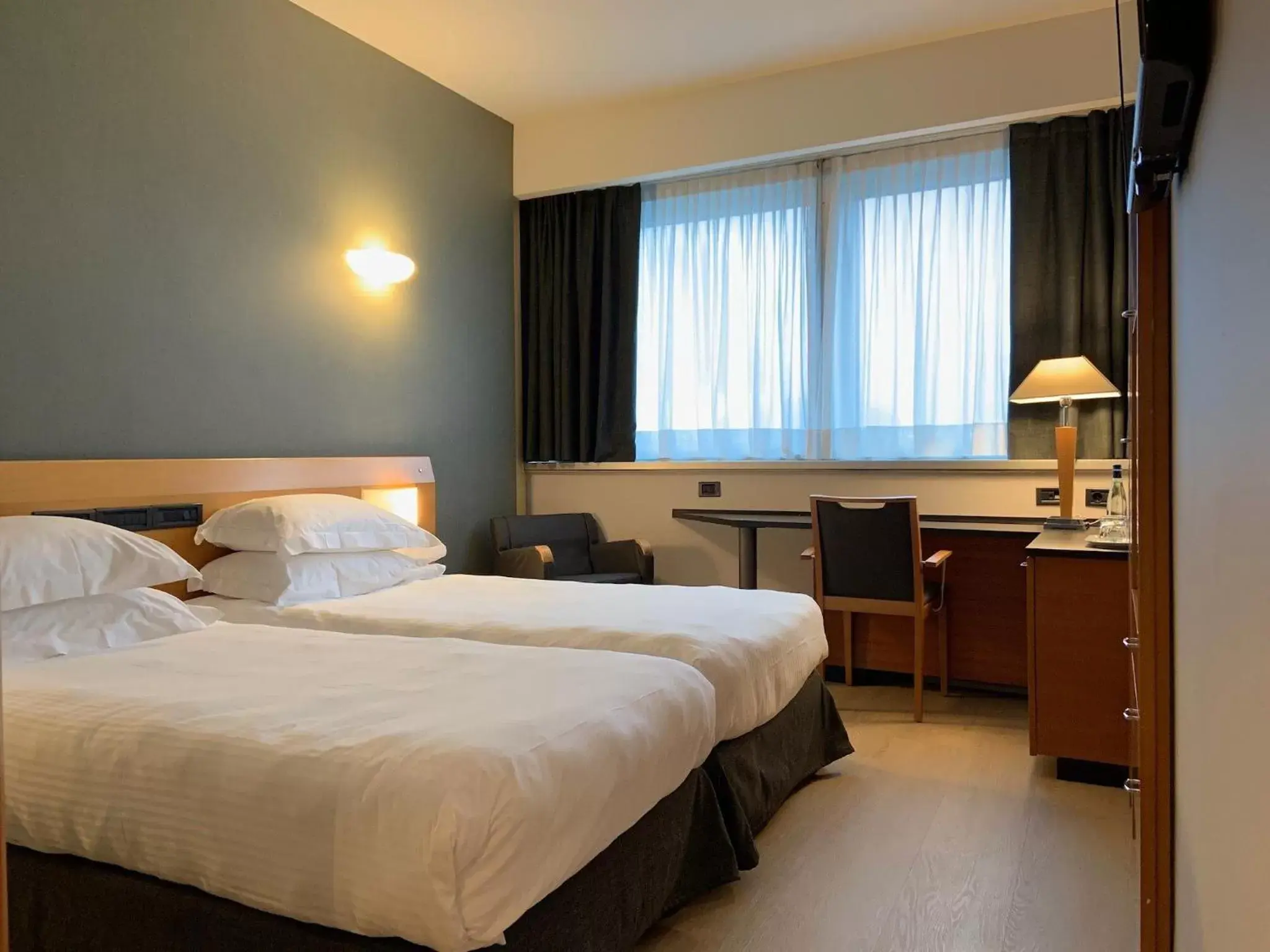 Photo of the whole room, Bed in Crowne Plaza Milan Linate, an IHG Hotel