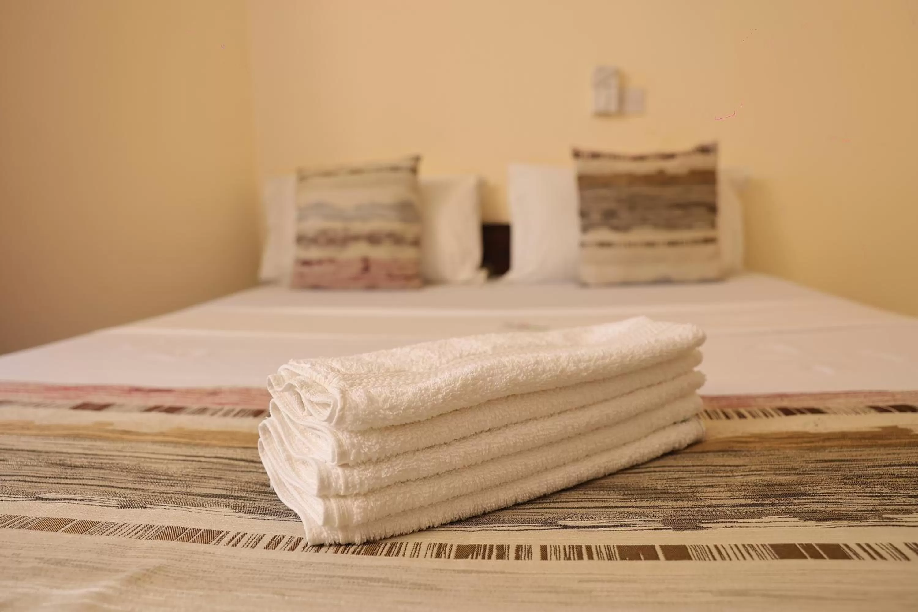 Bed in Merry Villa Hotel & Apartments