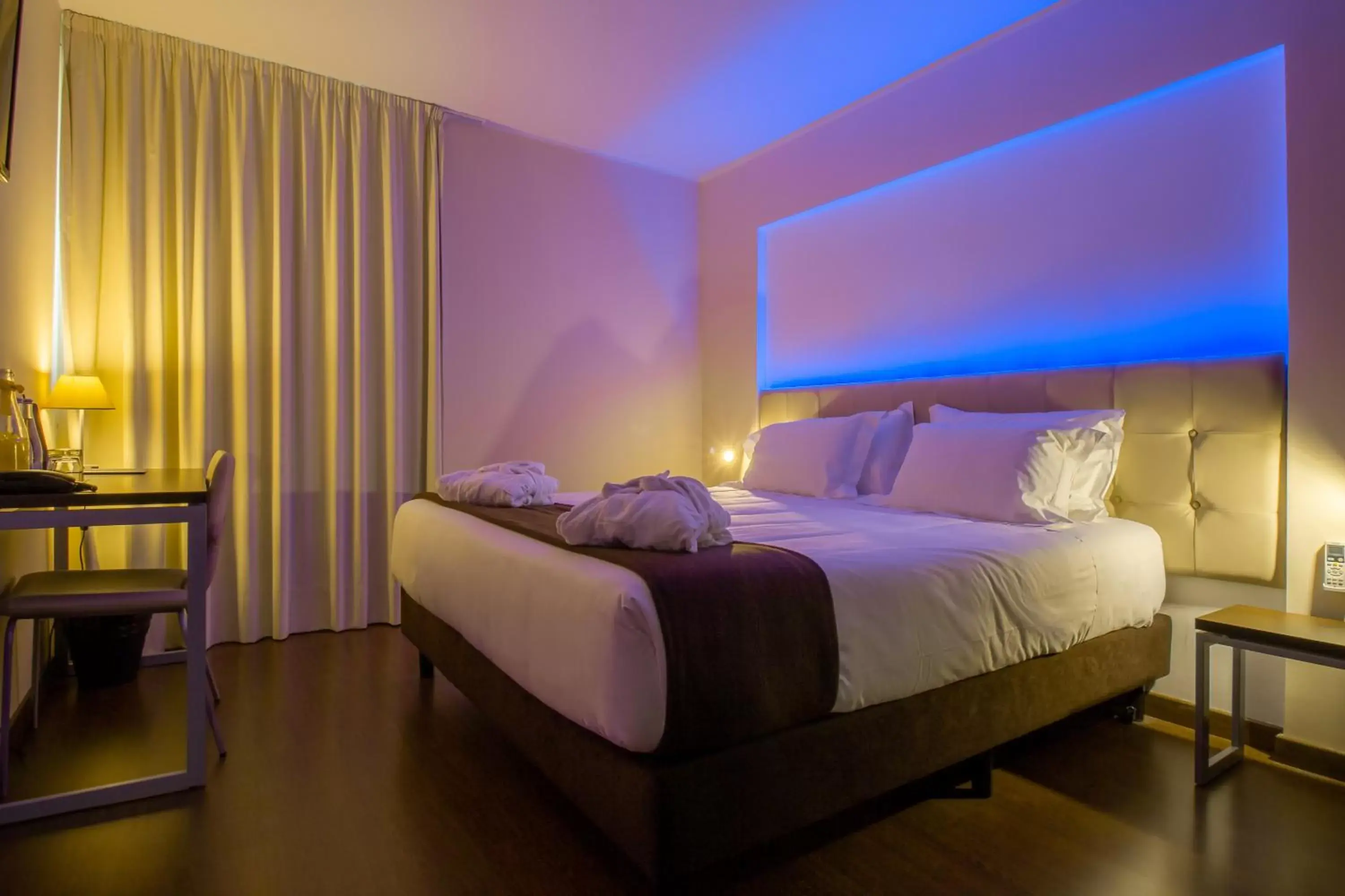 Bed in In Gold Hotel & Spa