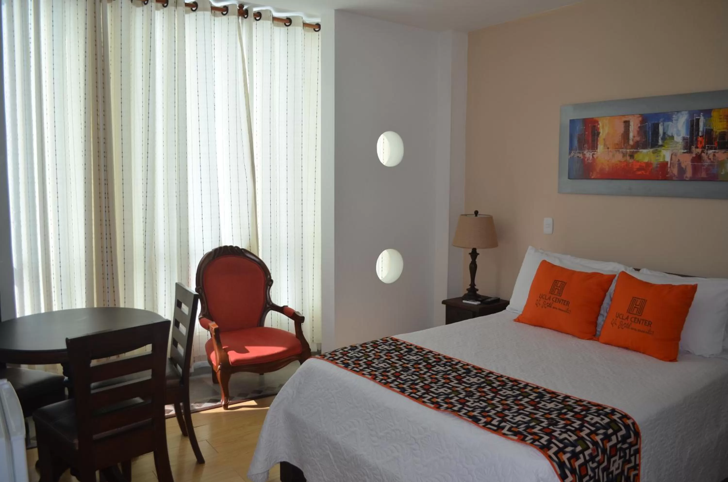 Photo of the whole room, Bed in Hotel Ucla Center