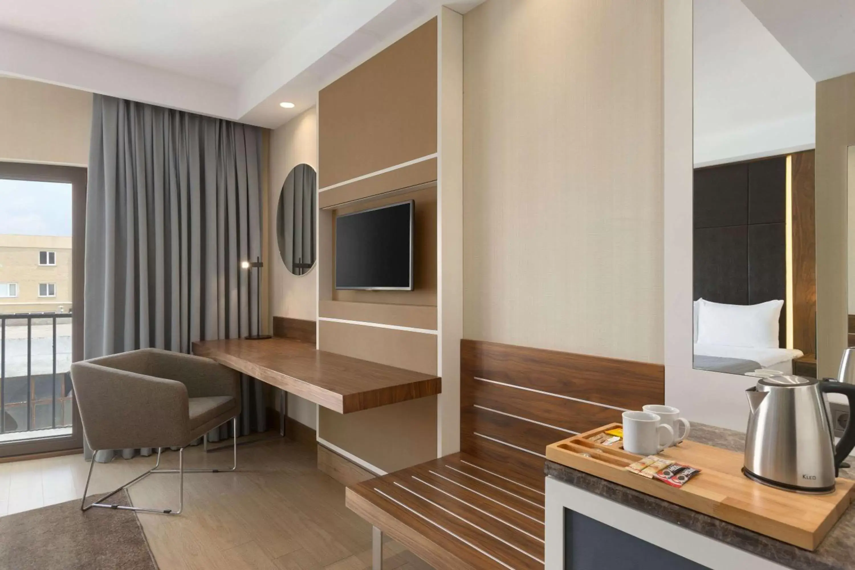 Photo of the whole room, TV/Entertainment Center in Ramada by Wyndham Istanbul Florya