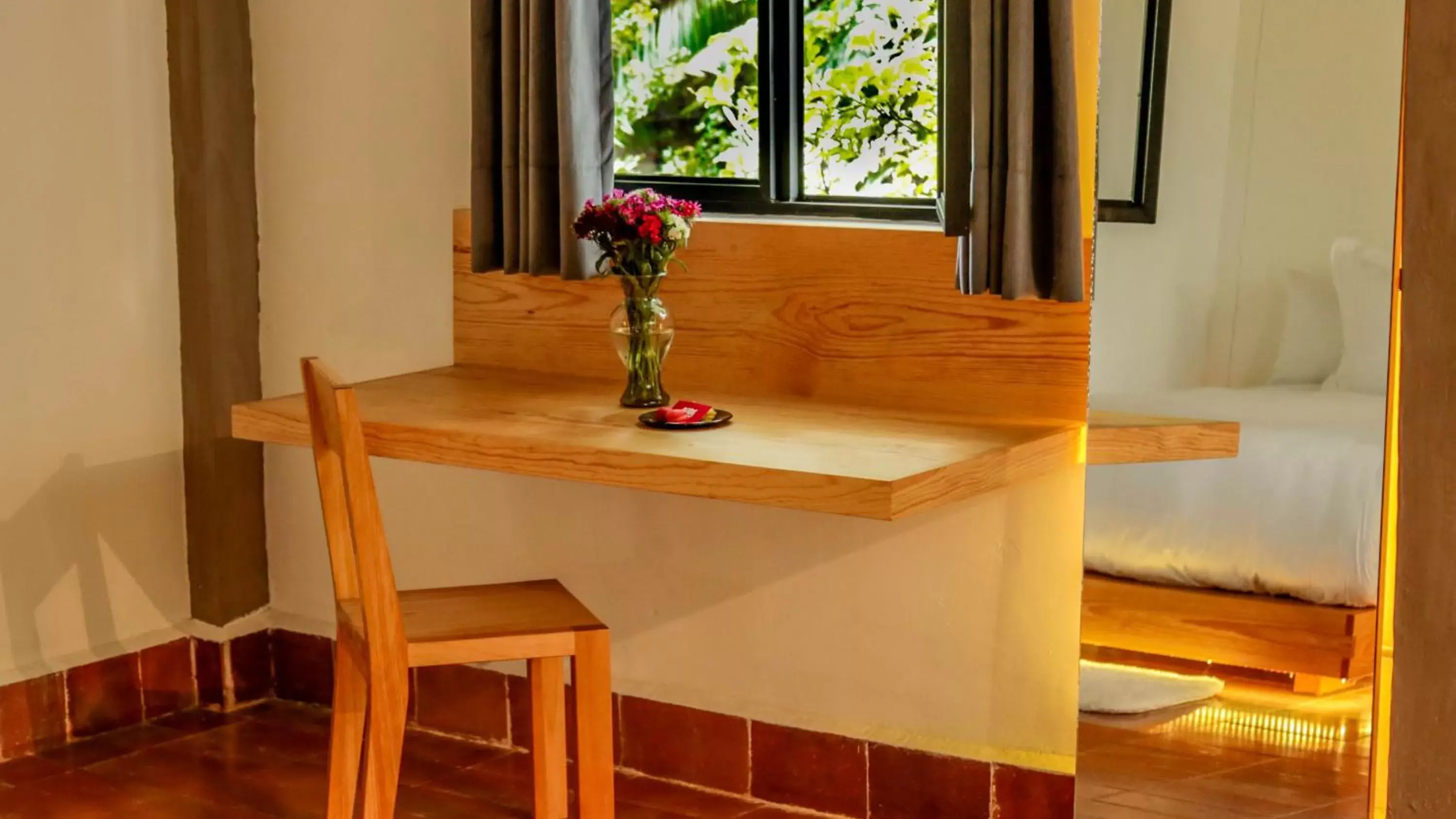 Bedroom, Dining Area in Agrado Guest House