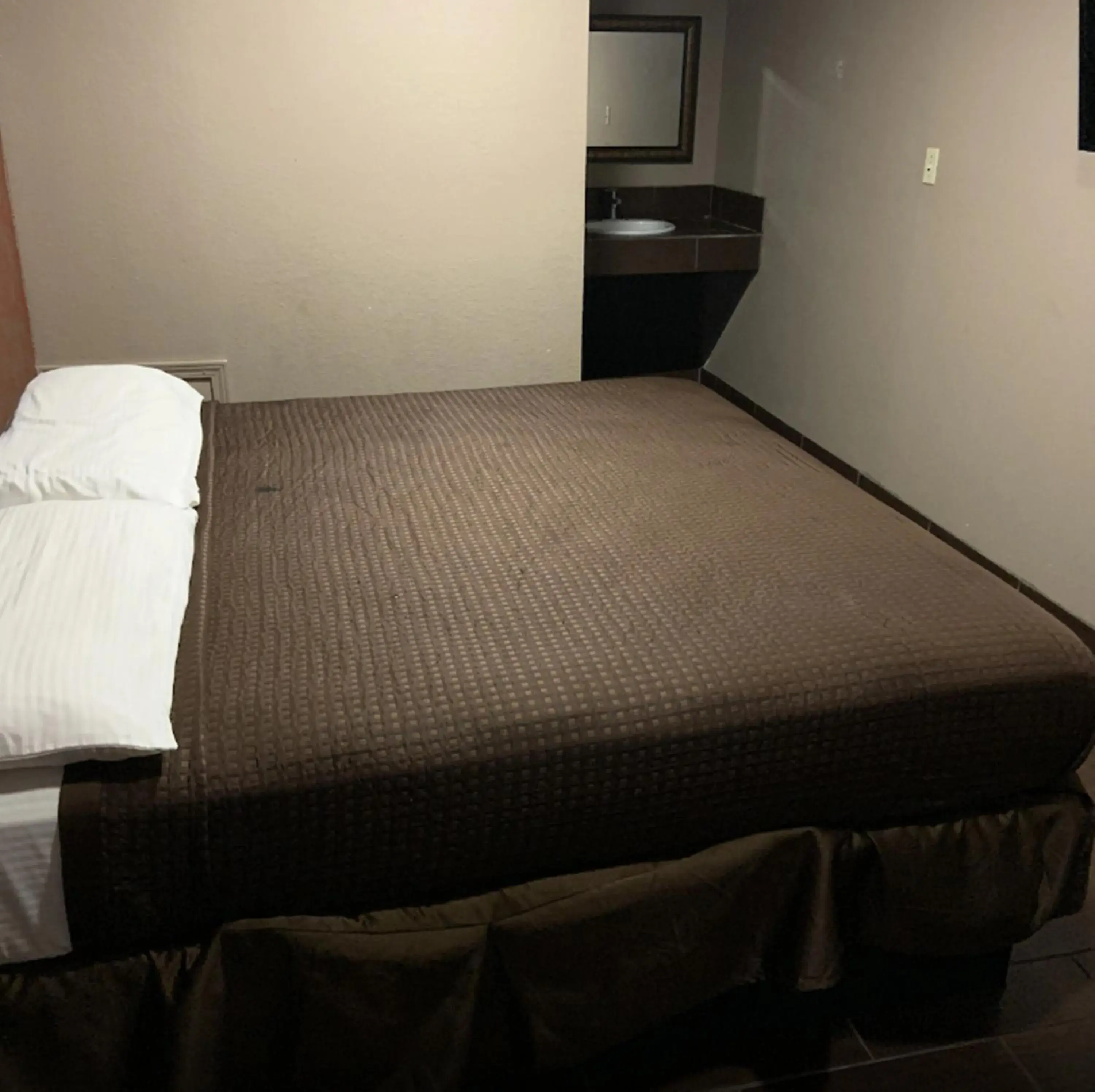 Bed in Royal Relax Inn