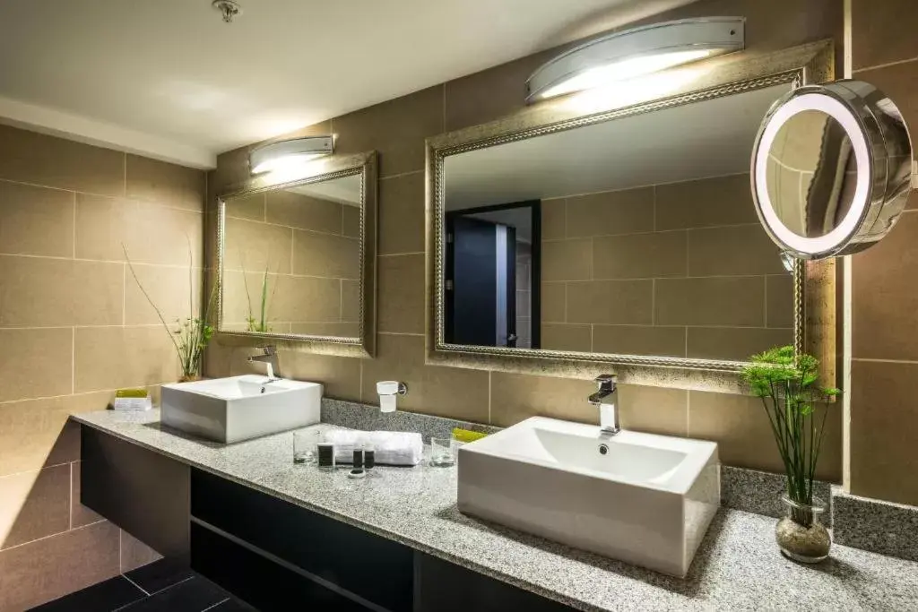 Bathroom in Urban Green Hotel & Suites