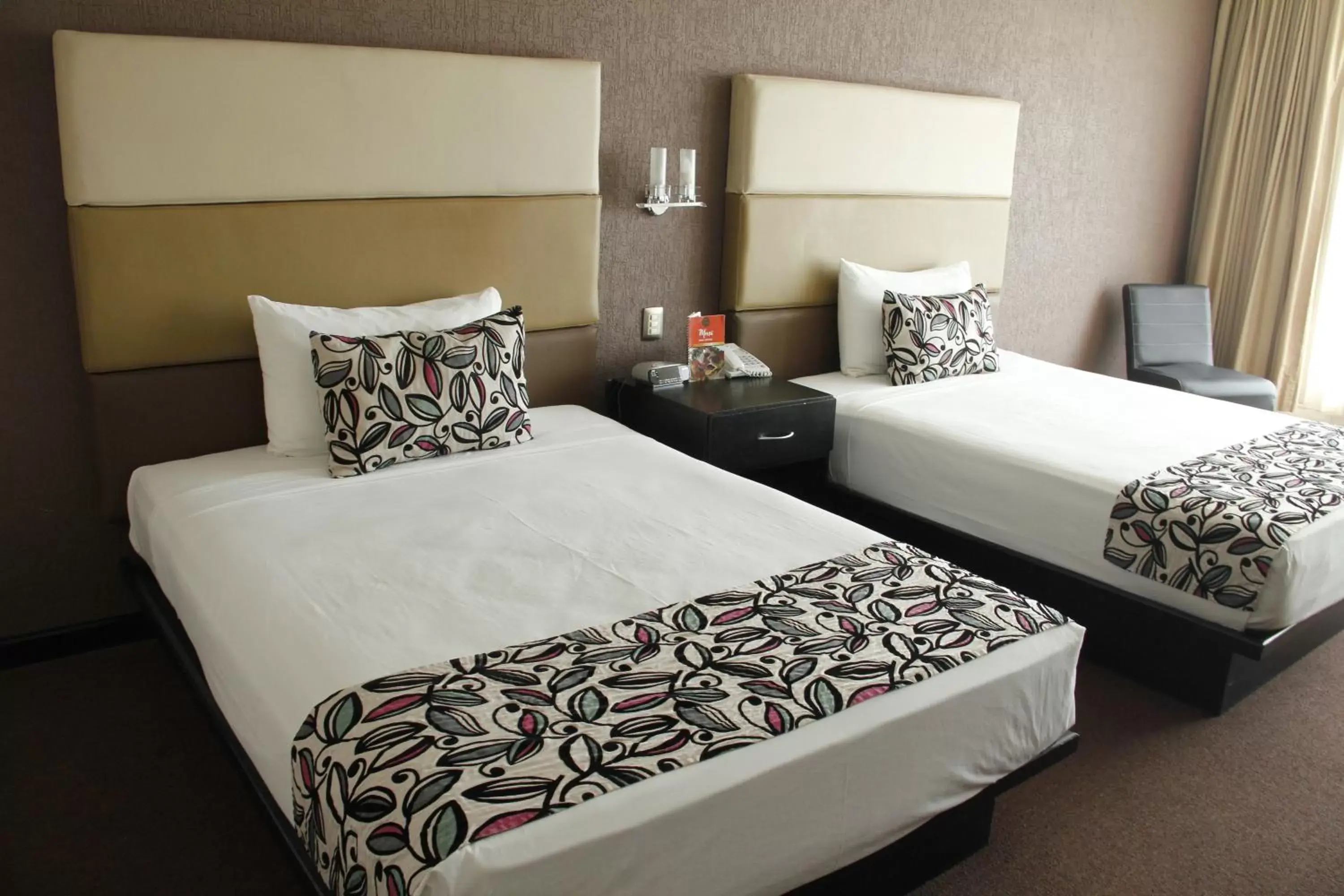 Bed in Hotel Vista Inn Premium