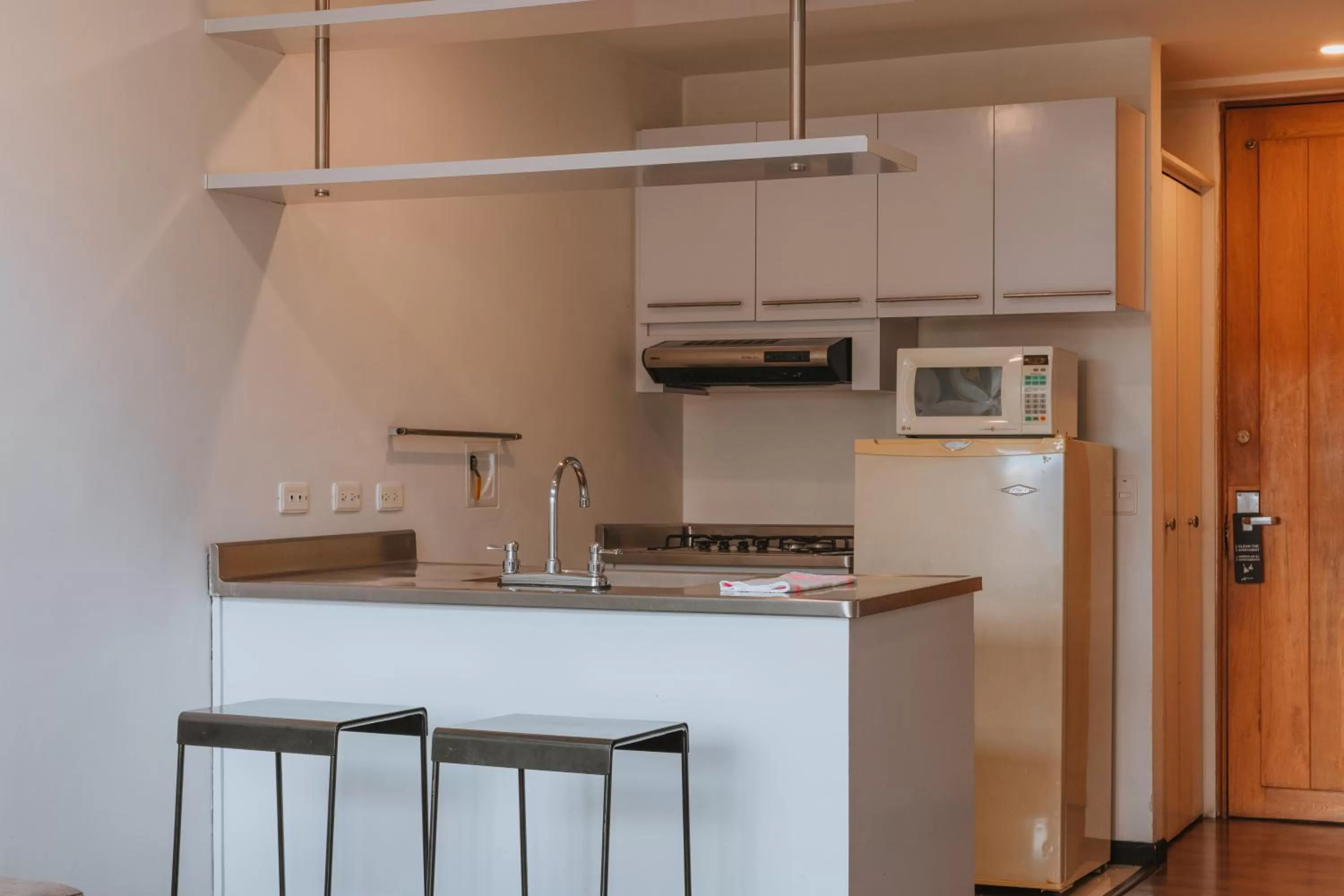 Kitchen or kitchenette in Travelers Orange Suites