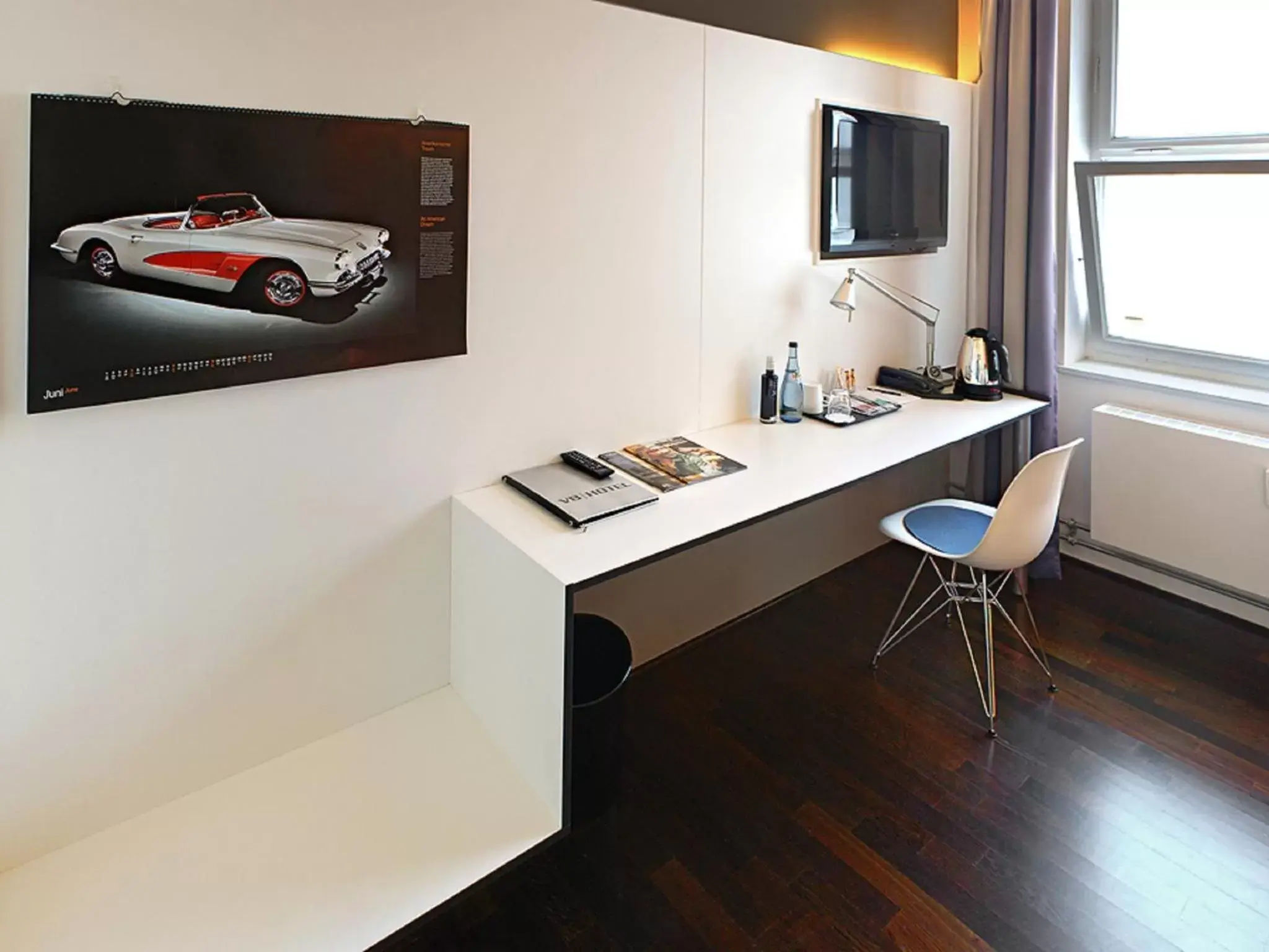 Seating area, TV/Entertainment Center in V8 HOTEL Classic Motorworld Region Stuttgart