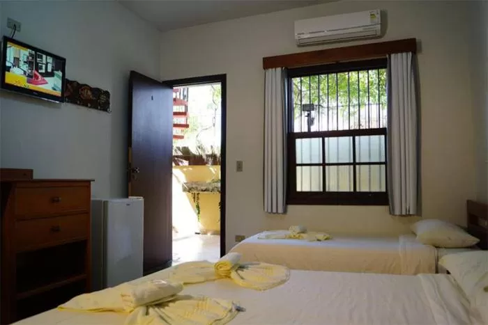 Bed in Pousada Manobra