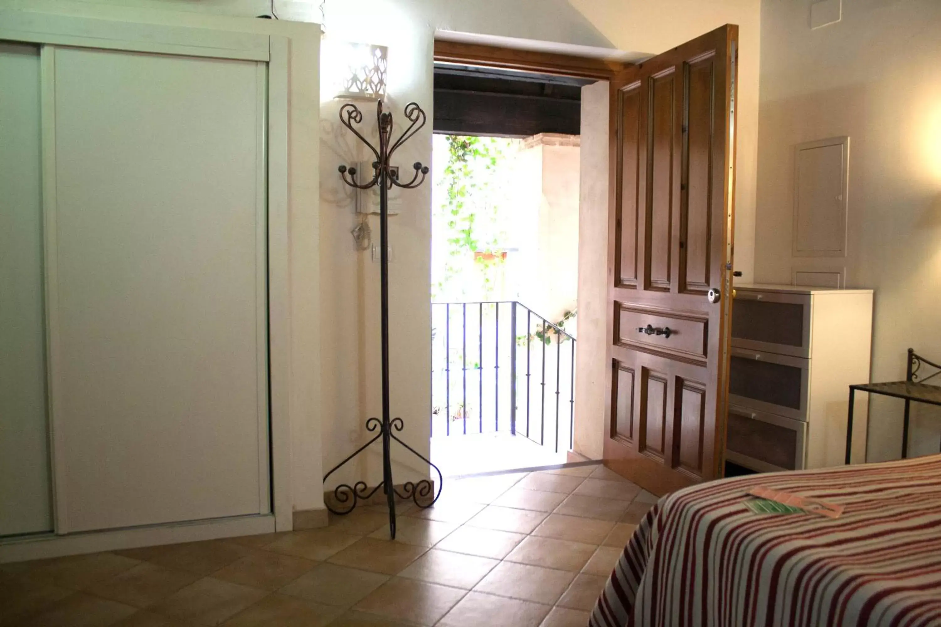 Bedroom, Seating Area in Abadia Suites