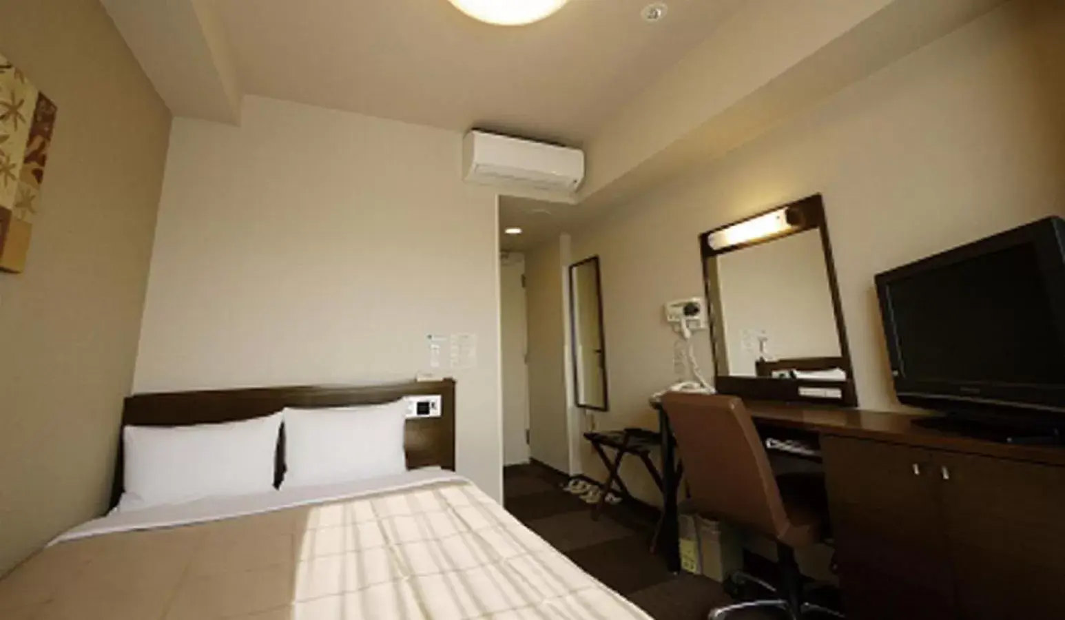 Photo of the whole room, Bed in Hotel Route-Inn Ena