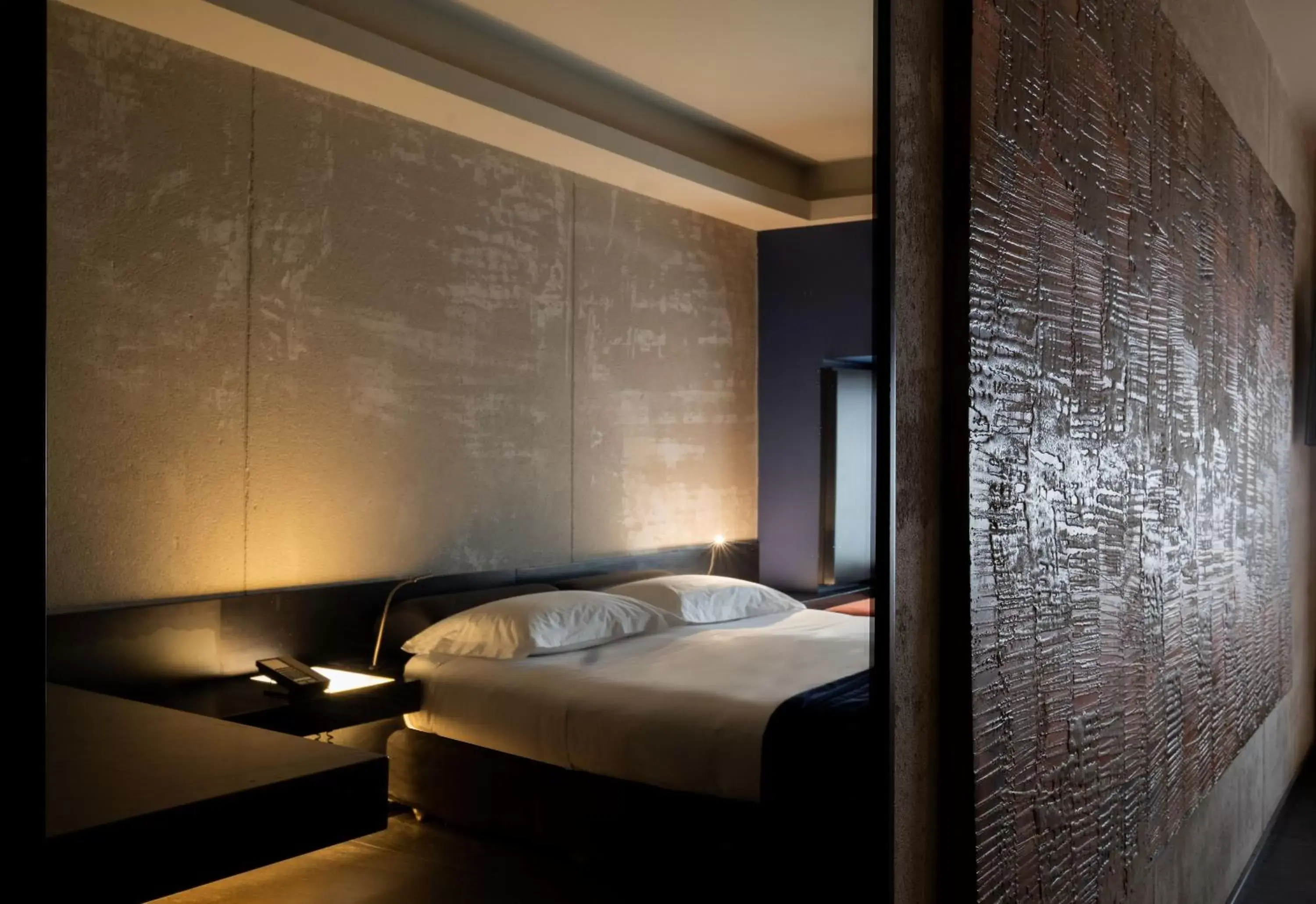 Bed in STRAF, Milan, a Member of Design Hotels