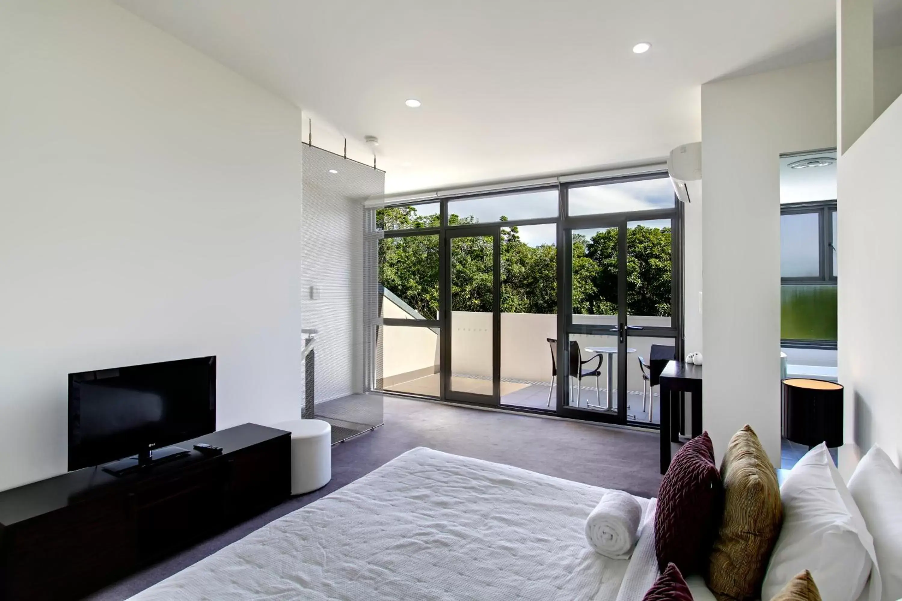 Bedroom, TV/Entertainment Center in Byron Butter Factory Apartments