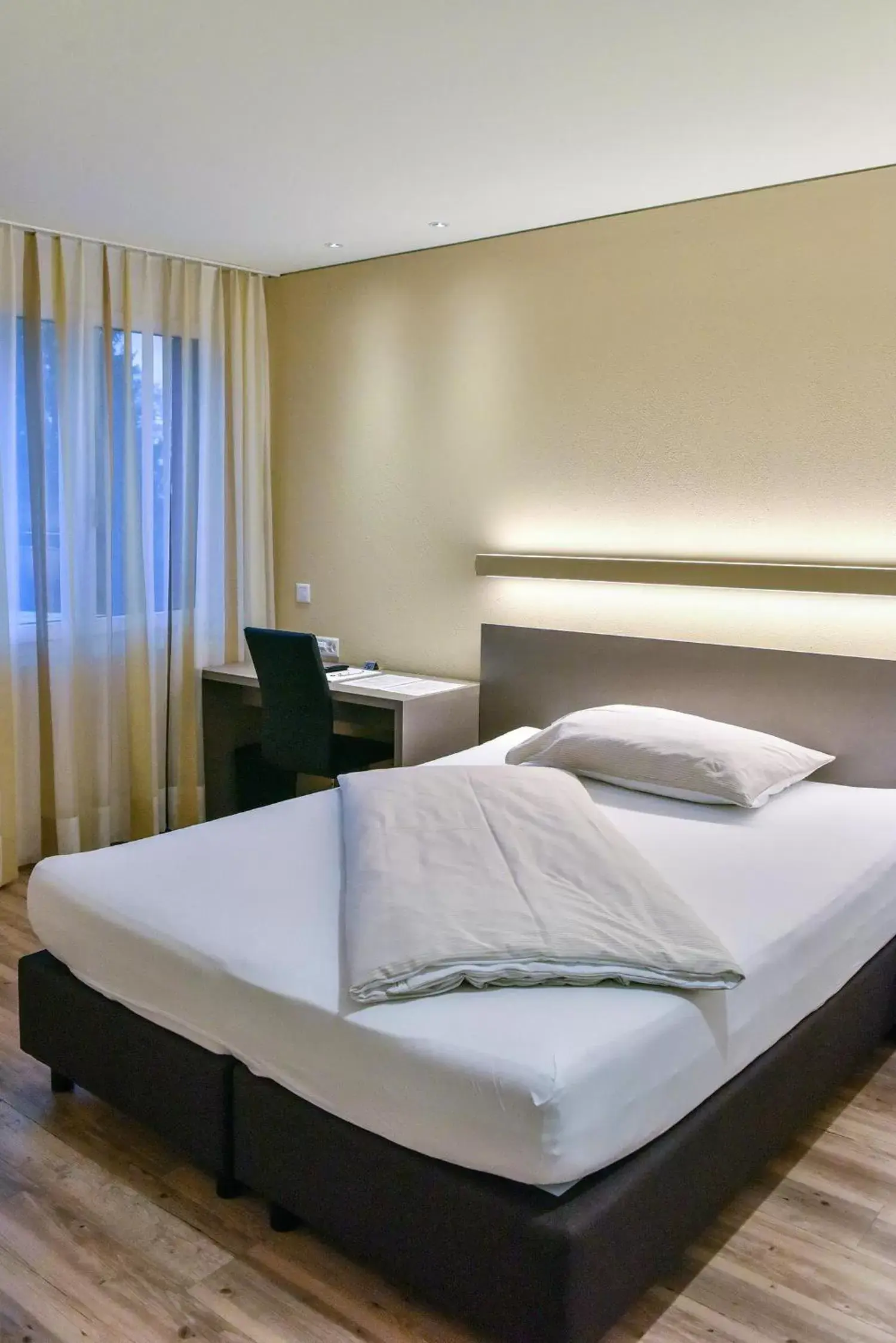 Bed in Hotel am Kreisel: Self-Service Check-In Hotel