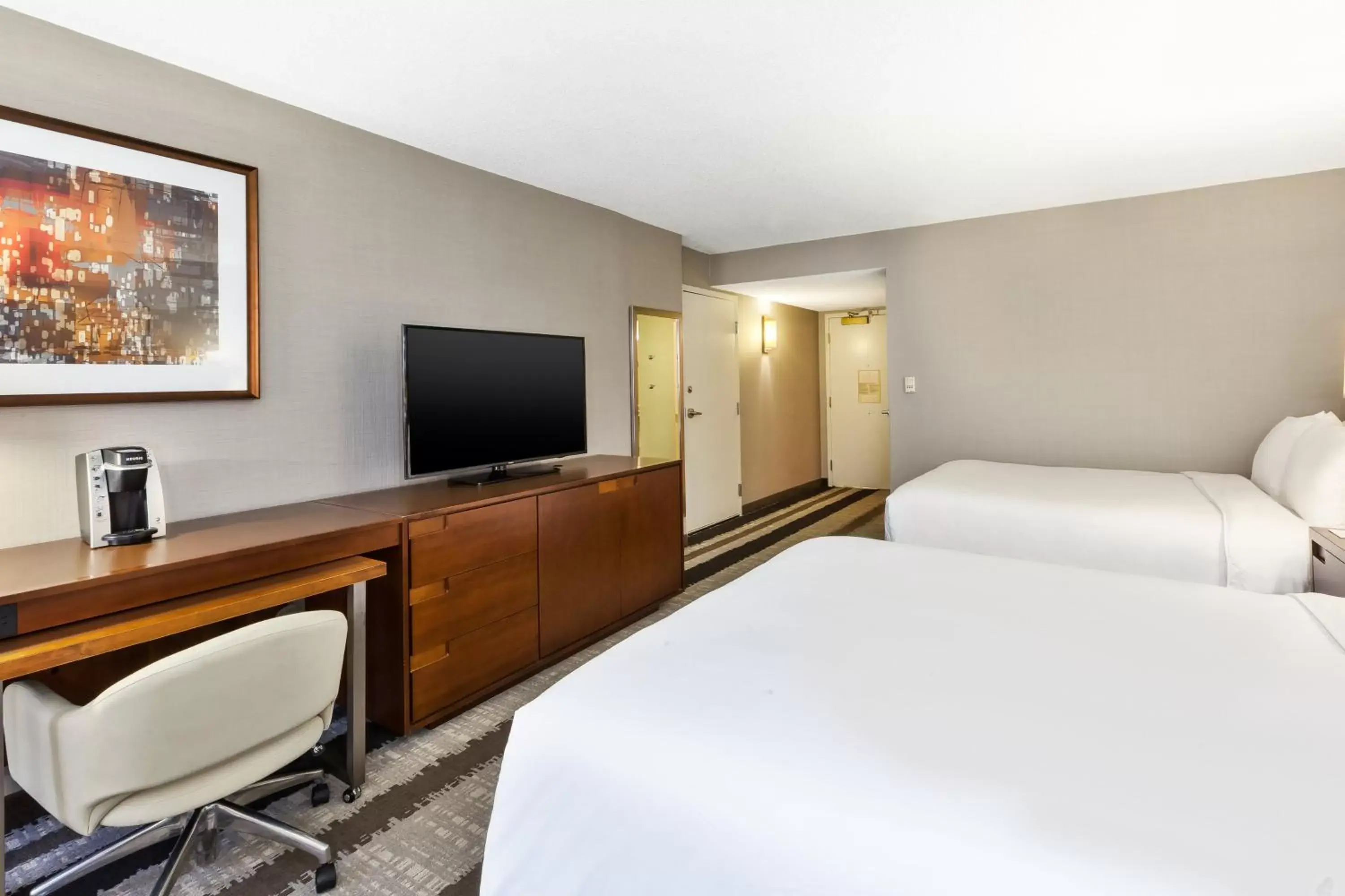 Photo of the whole room, TV/Entertainment Center in Crowne Plaza Dulles Airport, an IHG Hotel