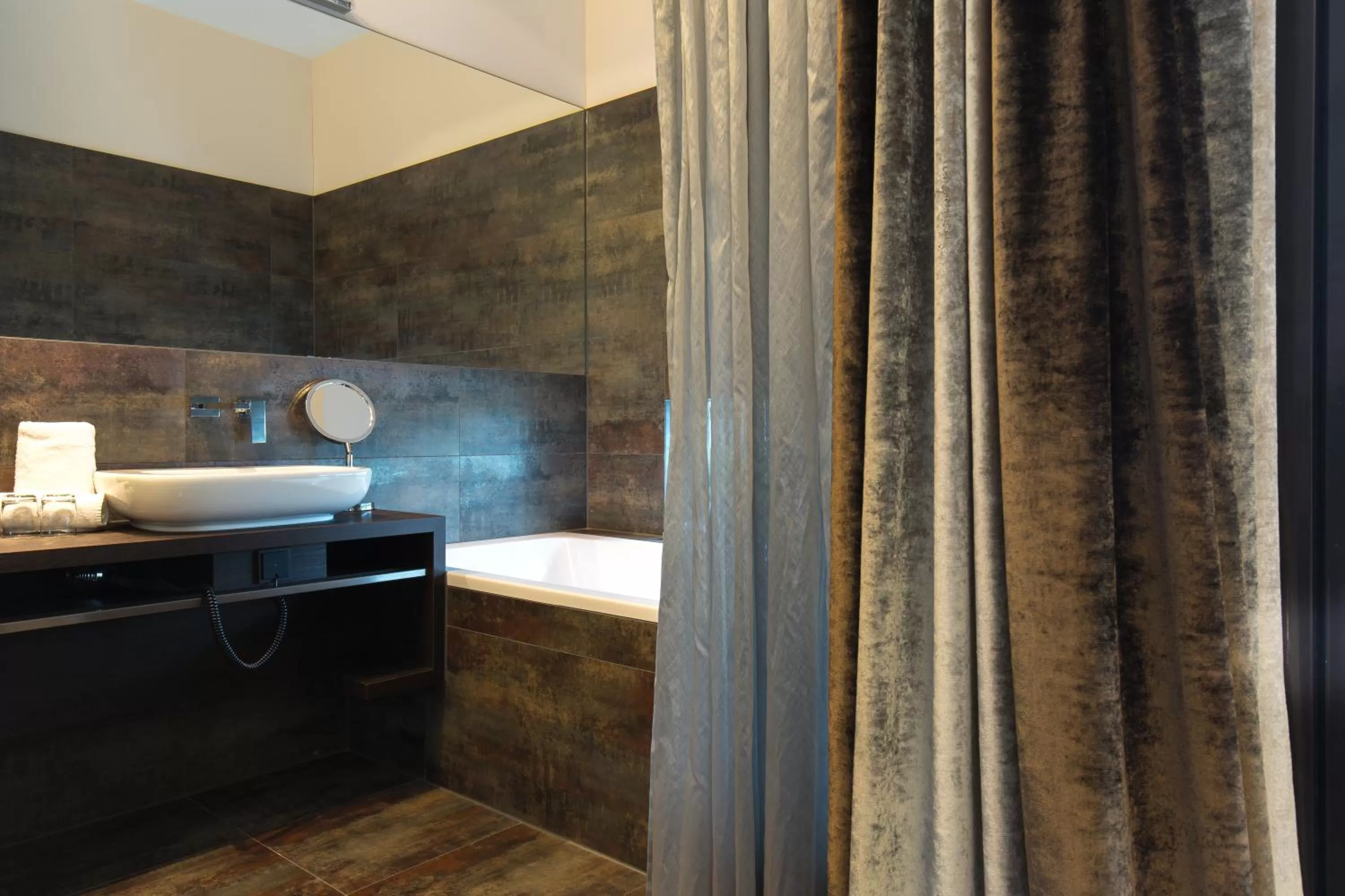 Bathroom in SAKS Urban Design Hotel Kaiserslautern